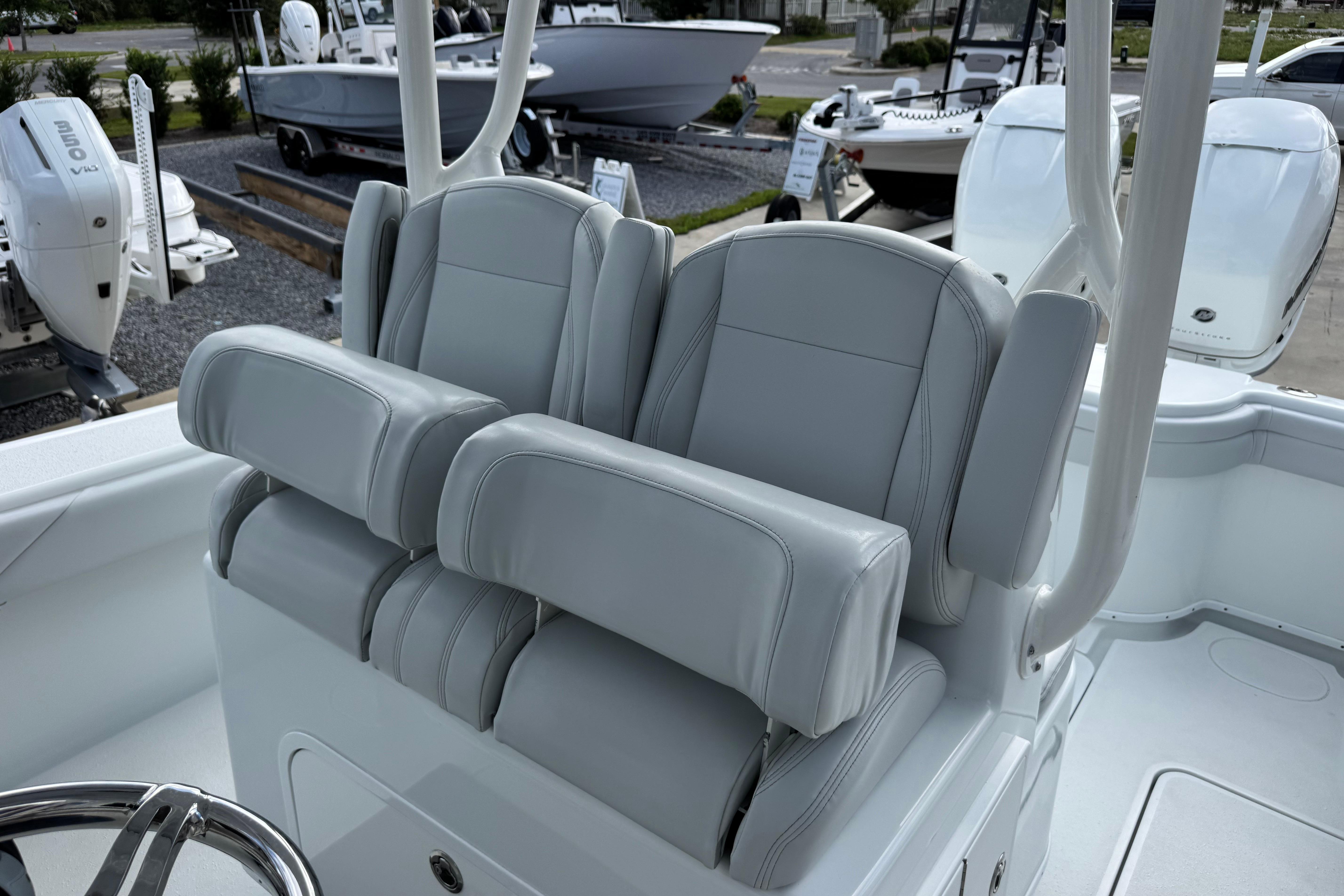 2022 Yellowfin 32 Offshore boat with dual cushioned seats and sleek design.
