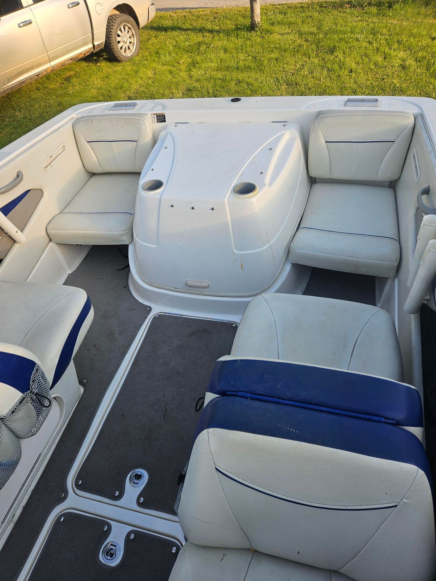 Interior of a 2006 Bayliner Cuddy Cab boat with seating.