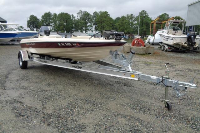 1996 Quantum 180 XD boat on trailer in outdoor storage area.