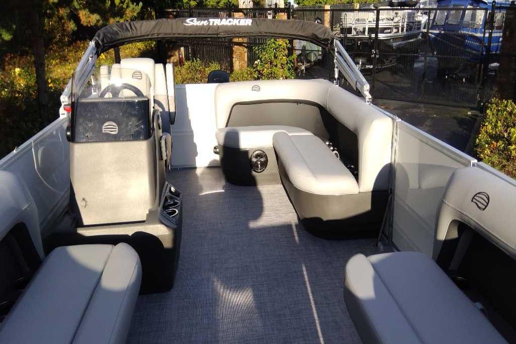 2026 Sun Tracker Party Barge 16 DLX interior with spacious seating and modern design.