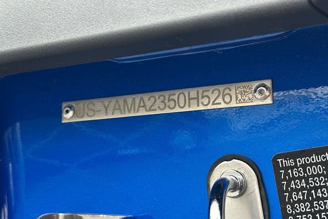 Close-up of a blue Yamaha WaveRunner with a serial number plate.