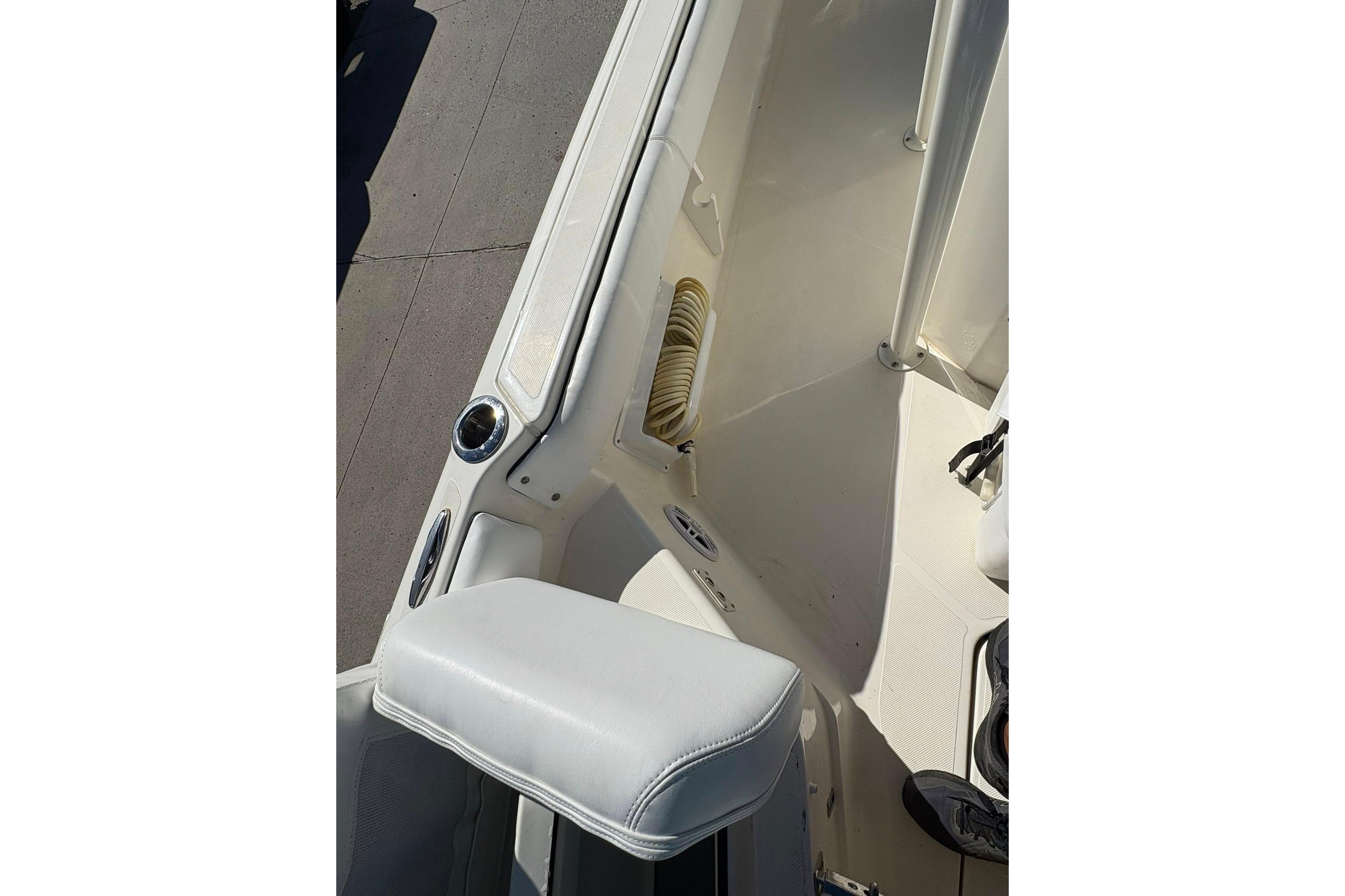 2023 Skeeter SX2550 Family boat interior with white seating and deck details.