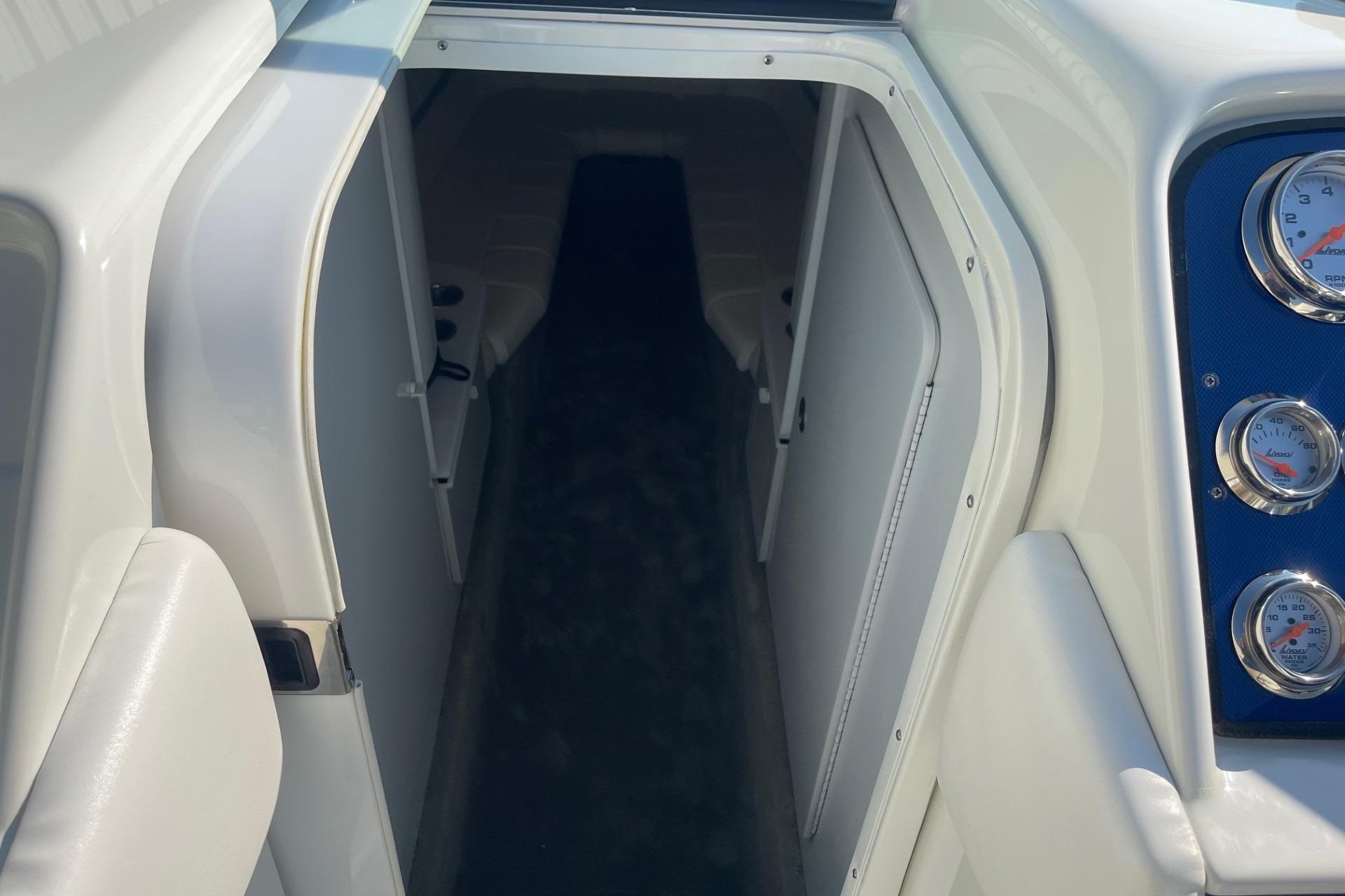 2004 Formula 382 FASTech boat interior with gauges and cabin entrance.