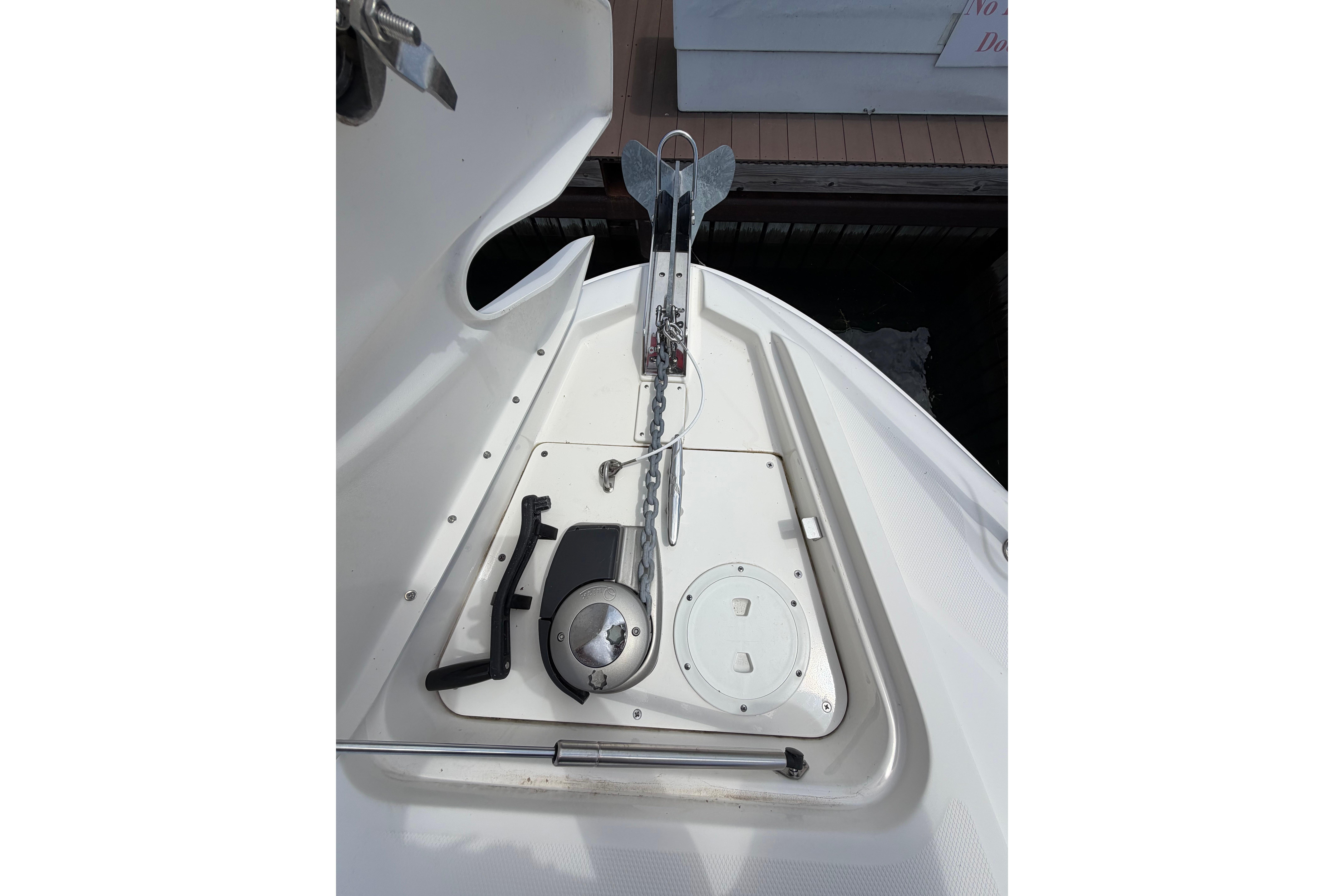 Anchor system on 2012 Sea Ray Sundancer 370 boat deck, featuring chain and winch.
