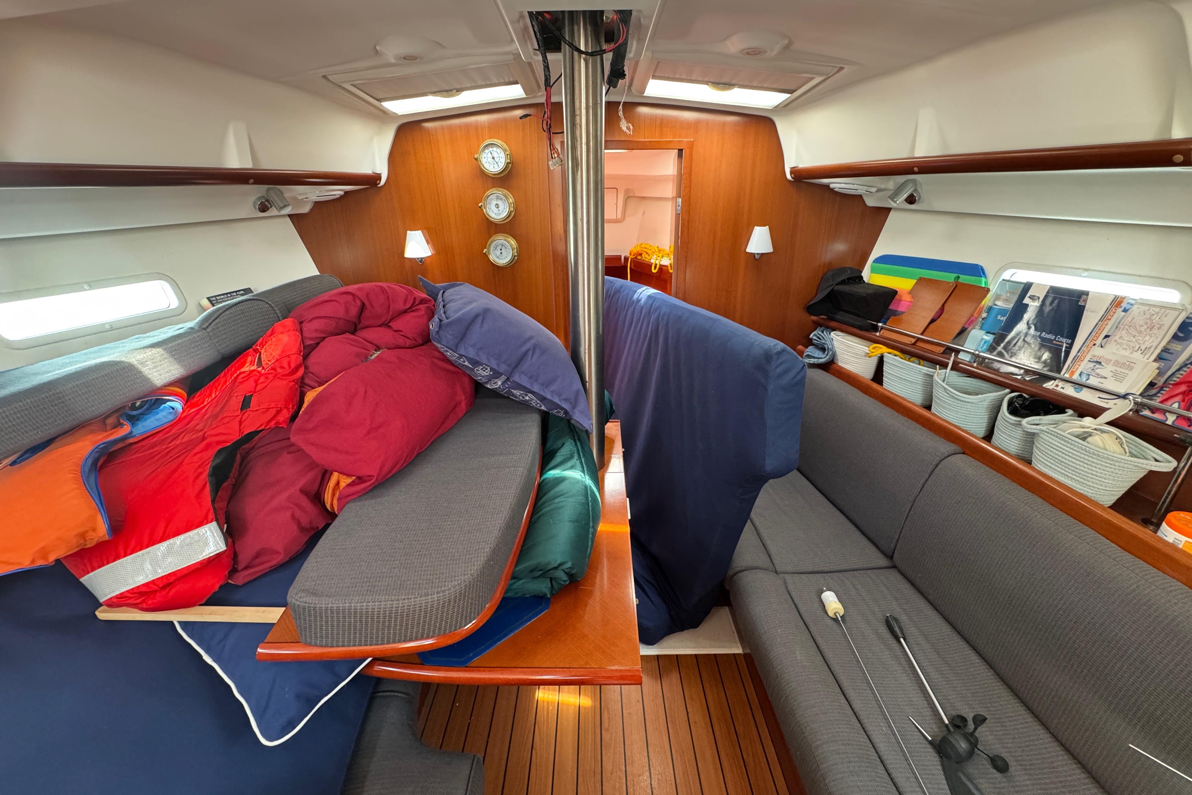 Interior of 2007 Beneteau Oceanis Clipper 373 sailboat with cozy seating and nautical decor.