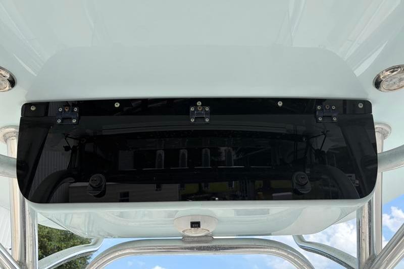 2024 Key West 239 FS boat console with sleek black panel and stainless steel fixtures.