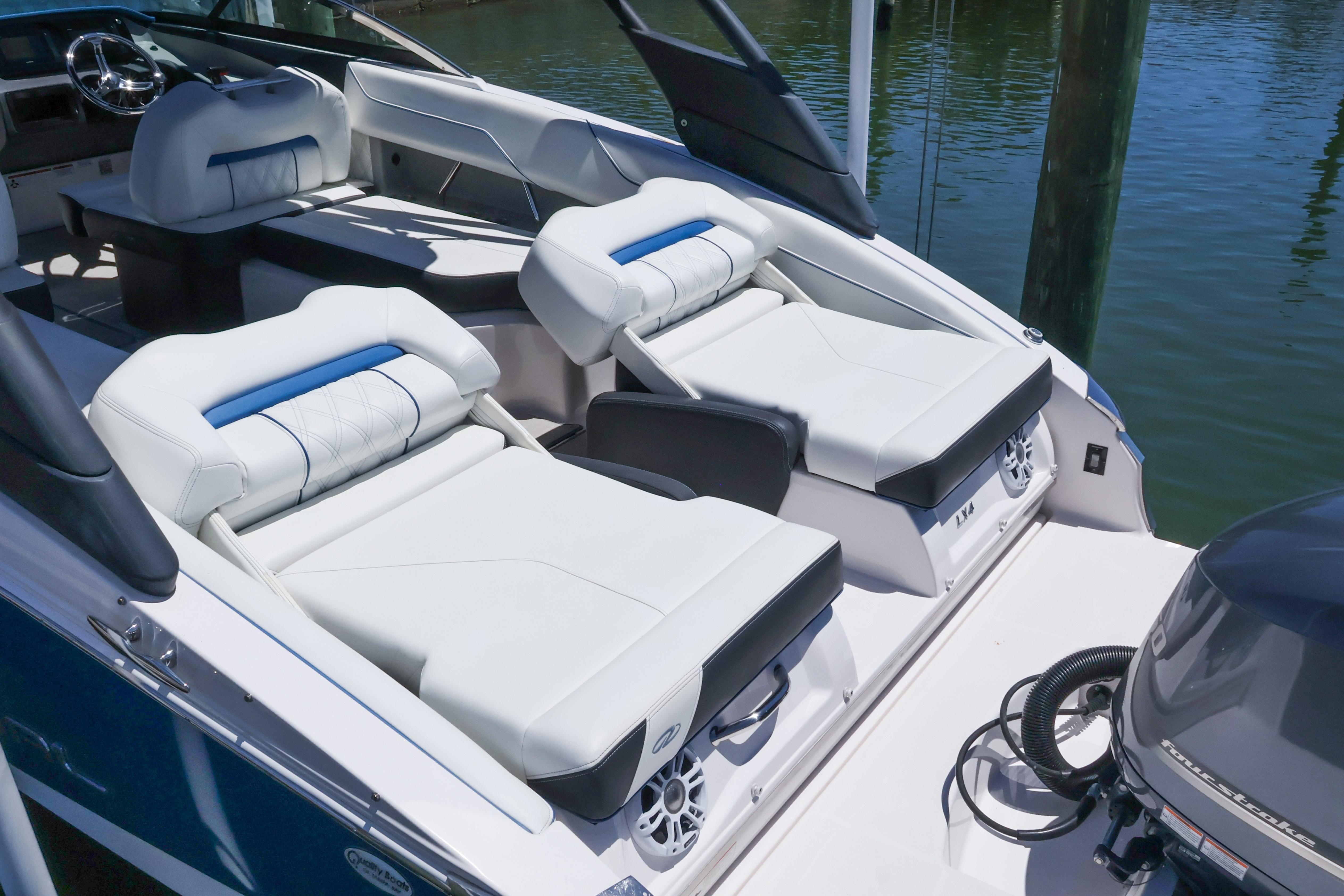 2020 Regal LX4 boat interior with luxurious white seating and modern design.