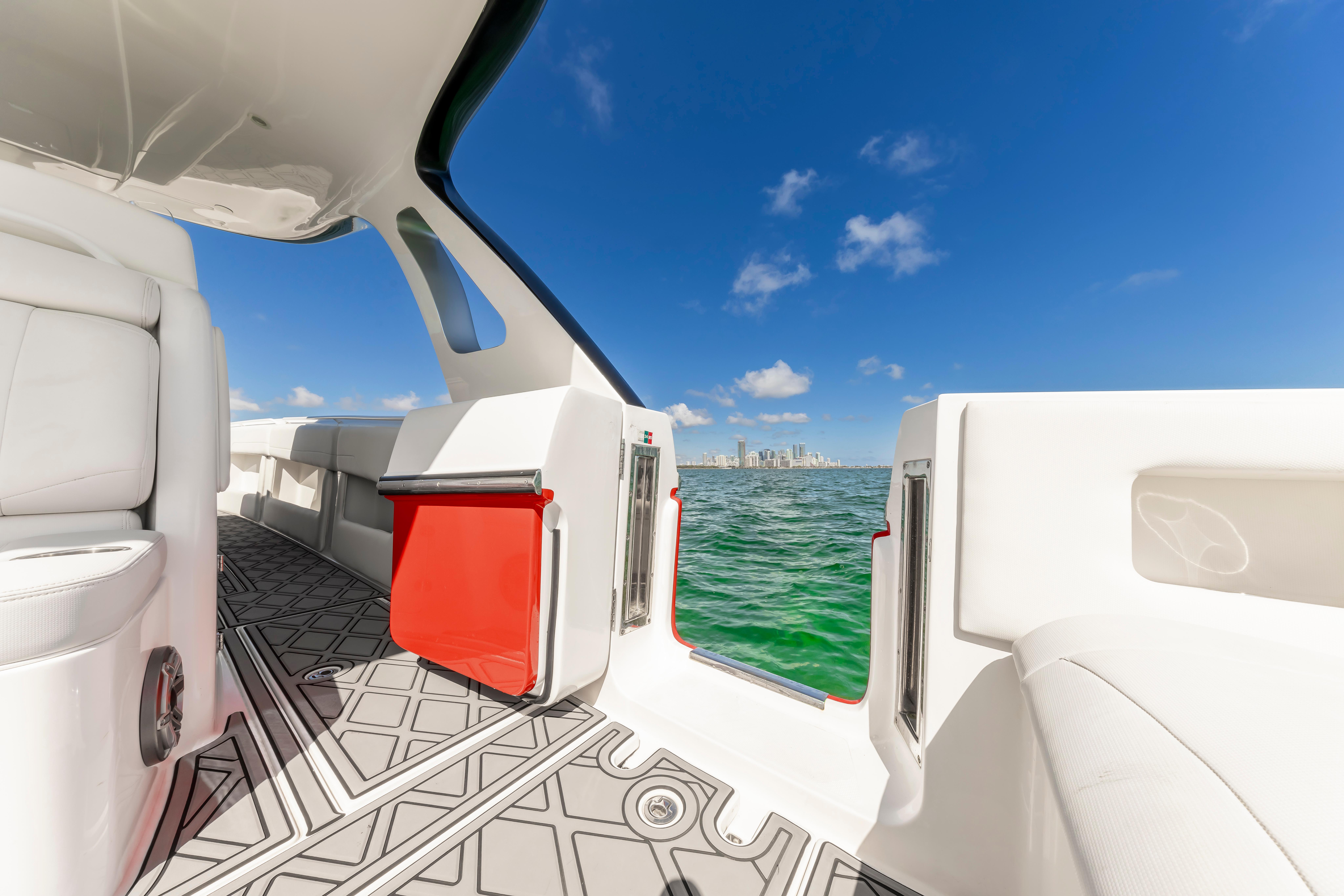 2016 Cigarette 41 GTR boat interior with ocean view and clear blue sky.