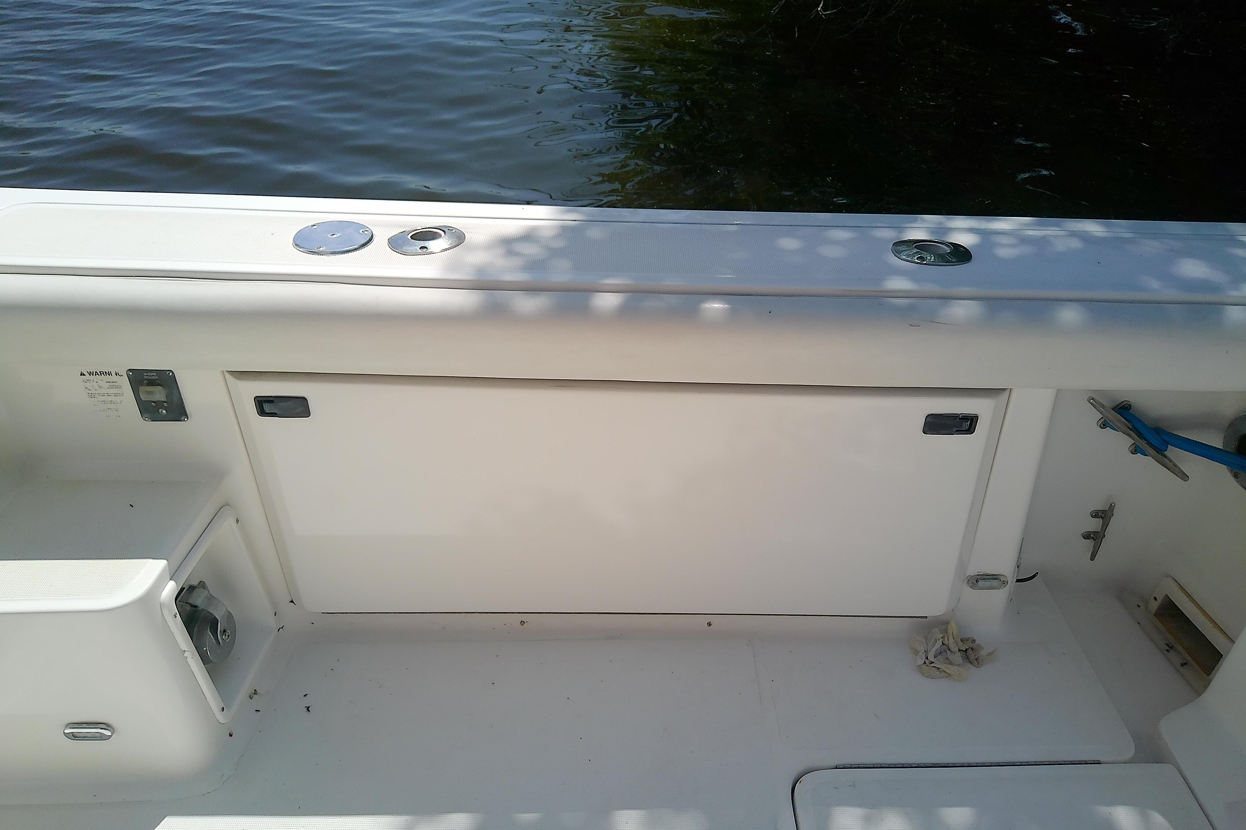 2000 Tiara Yachts 4100 Open boat deck with storage compartments and water view.