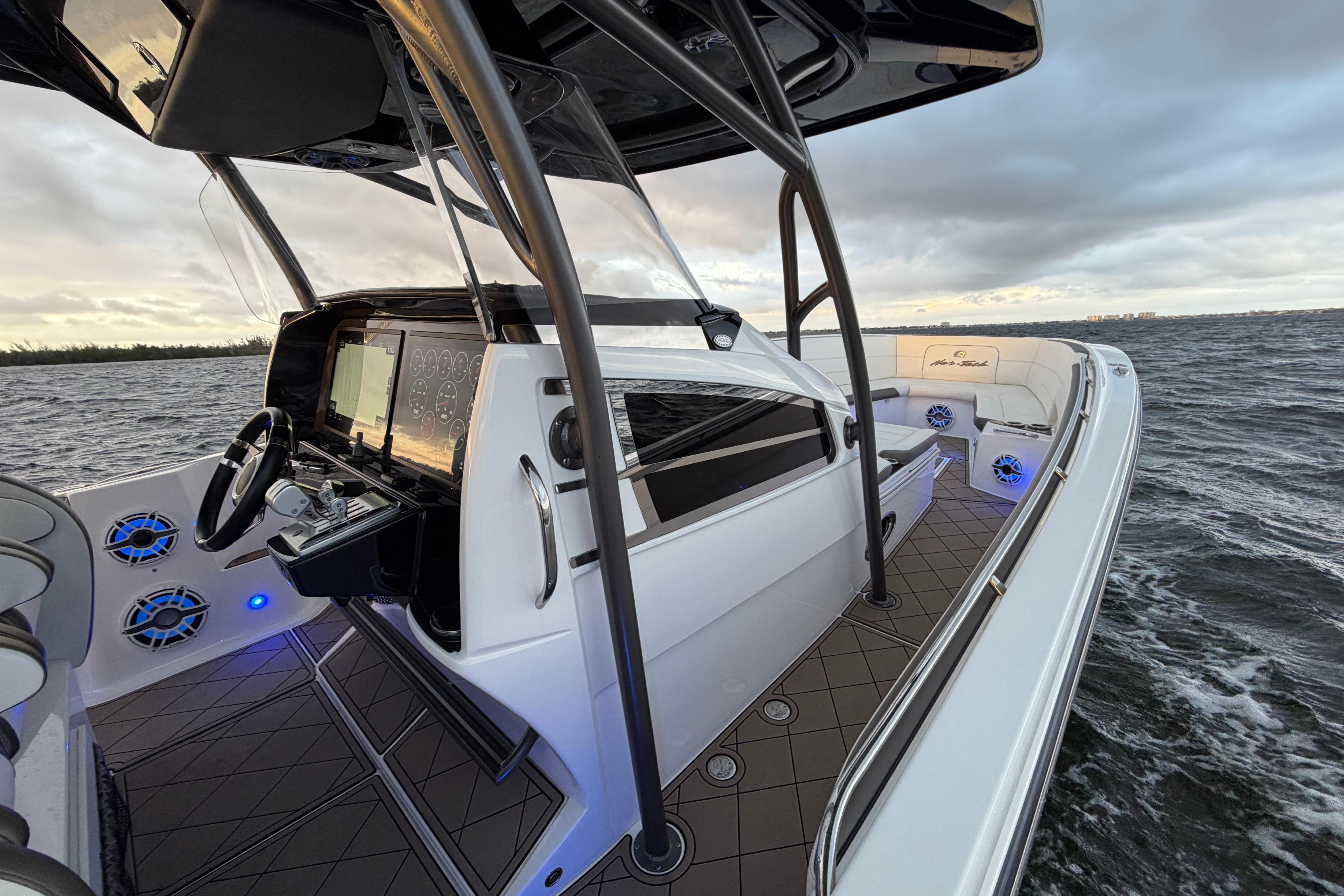 2021 Nor-Tech 390 Sport Center Console on water, featuring sleek design and advanced controls.