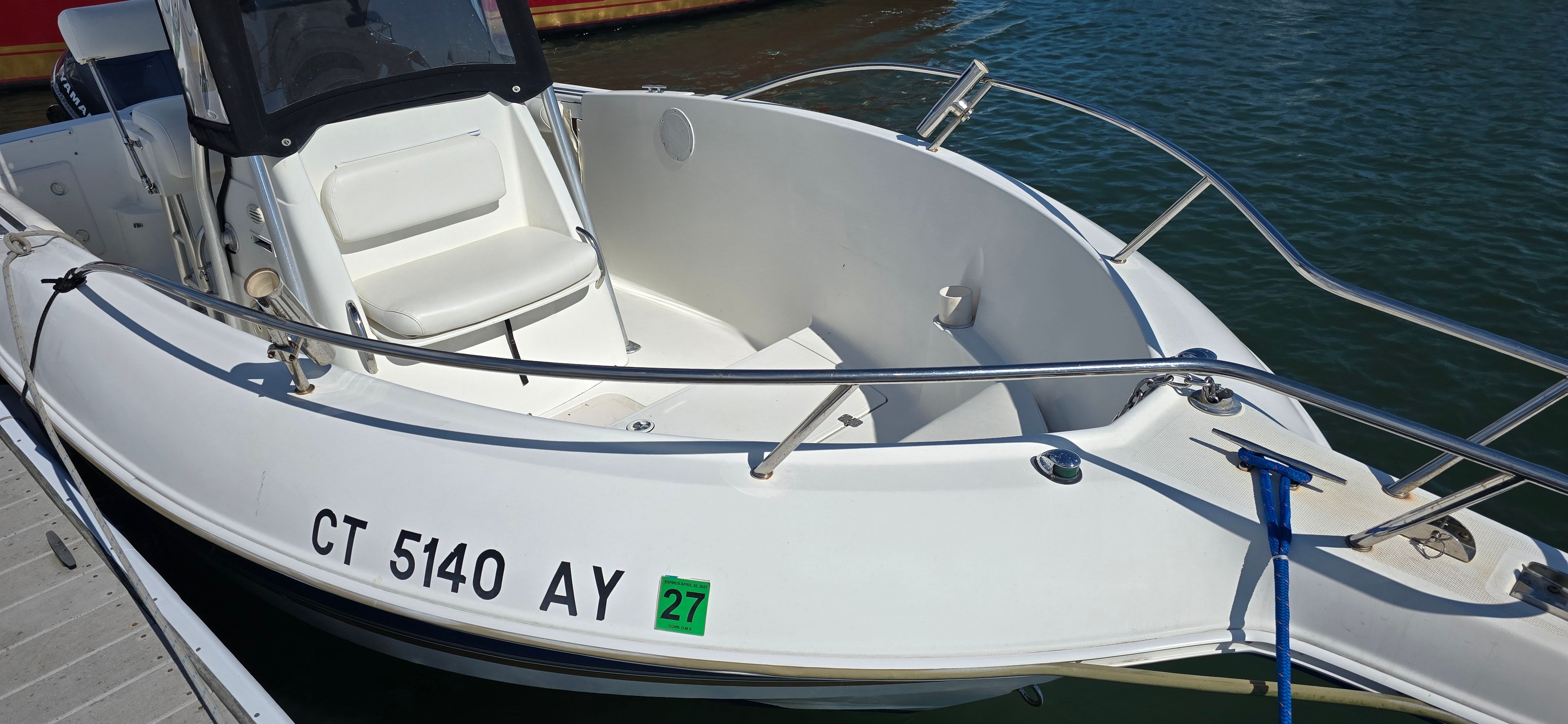 Aquasport 205 Osprey 2003 docked at a marina.