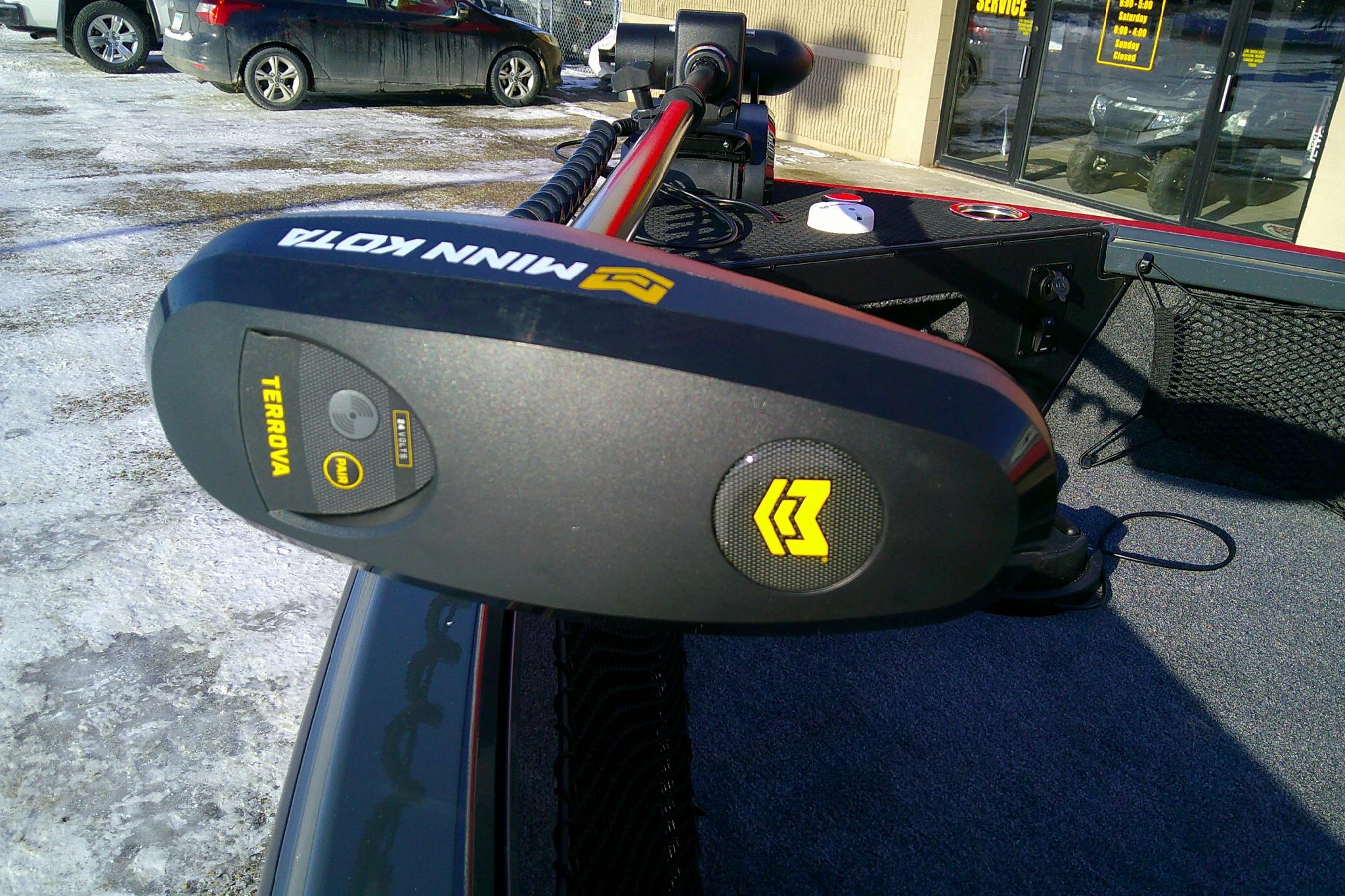 Minn Kota Terrova motor on 2026 Ranger VS1882SC Reata boat, parked outside a service center.