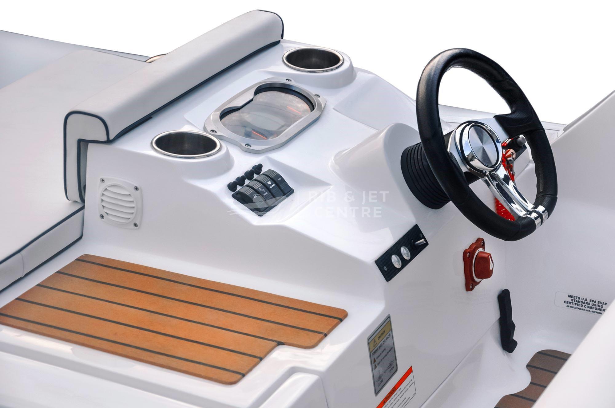 2023 AB Inflatables ABJET 350XP boat dashboard with steering wheel and controls.