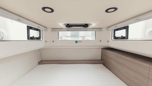 Interior cabin of 2025 Saxdor 400 GTC boat with modern design and ample natural light.