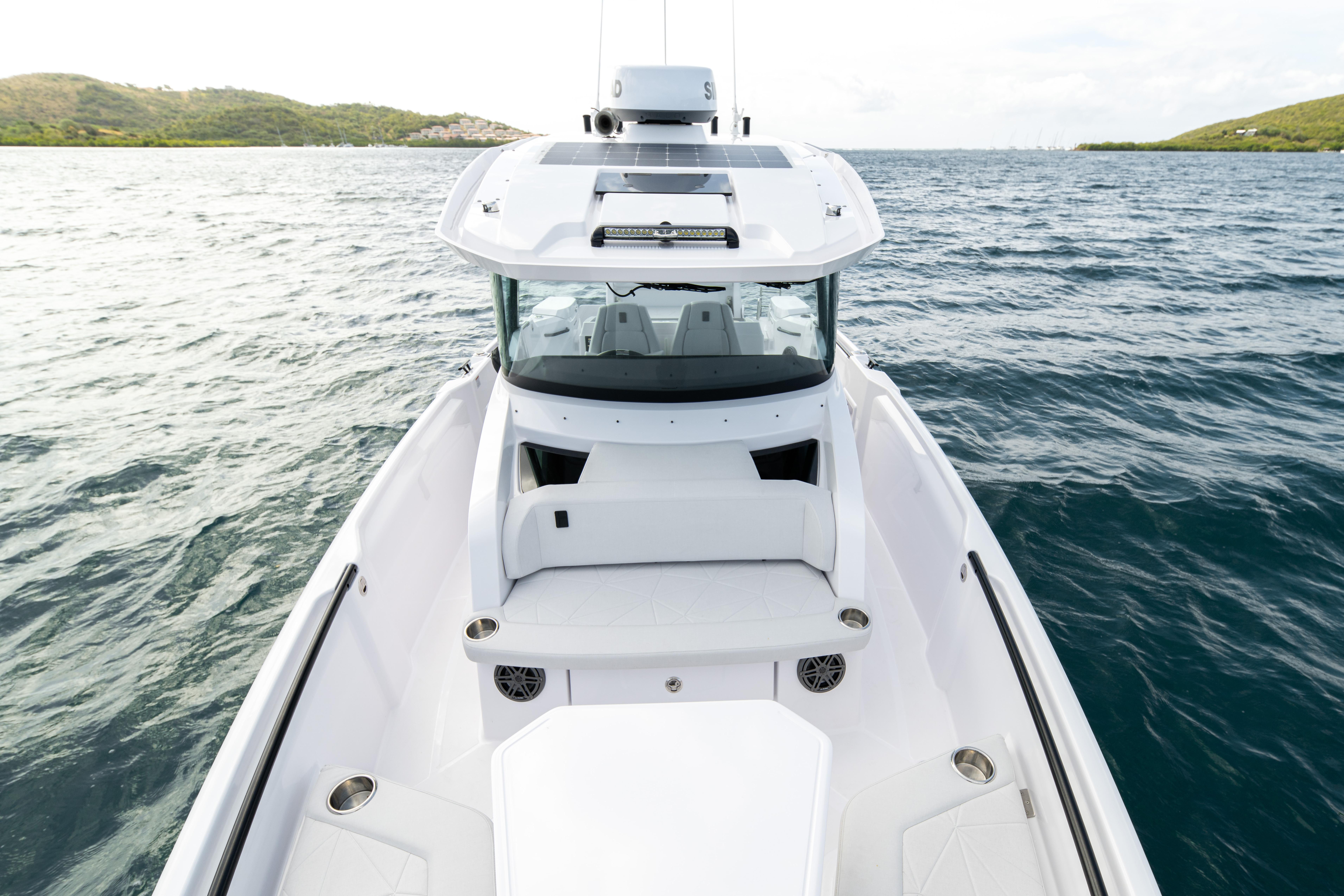 2025 Axopar 29 CCX boat on open water, showcasing sleek design and modern features.