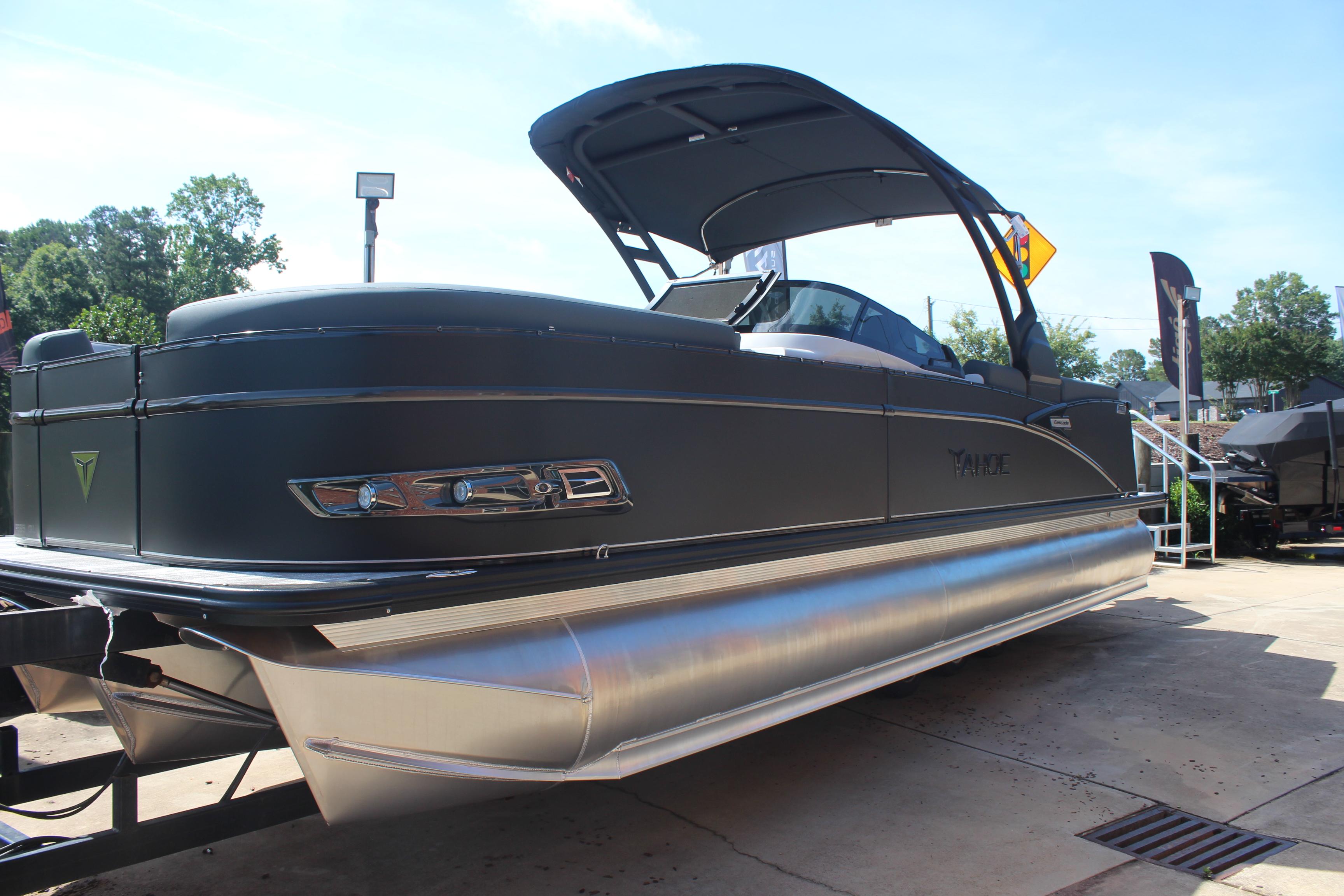 2025 Tahoe Pontoon Cascade Quad Lounge Windshield on display outdoors.