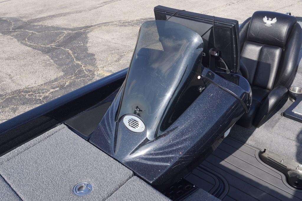 2025 Phoenix 921 Elite boat cockpit with sleek design and comfortable seating.