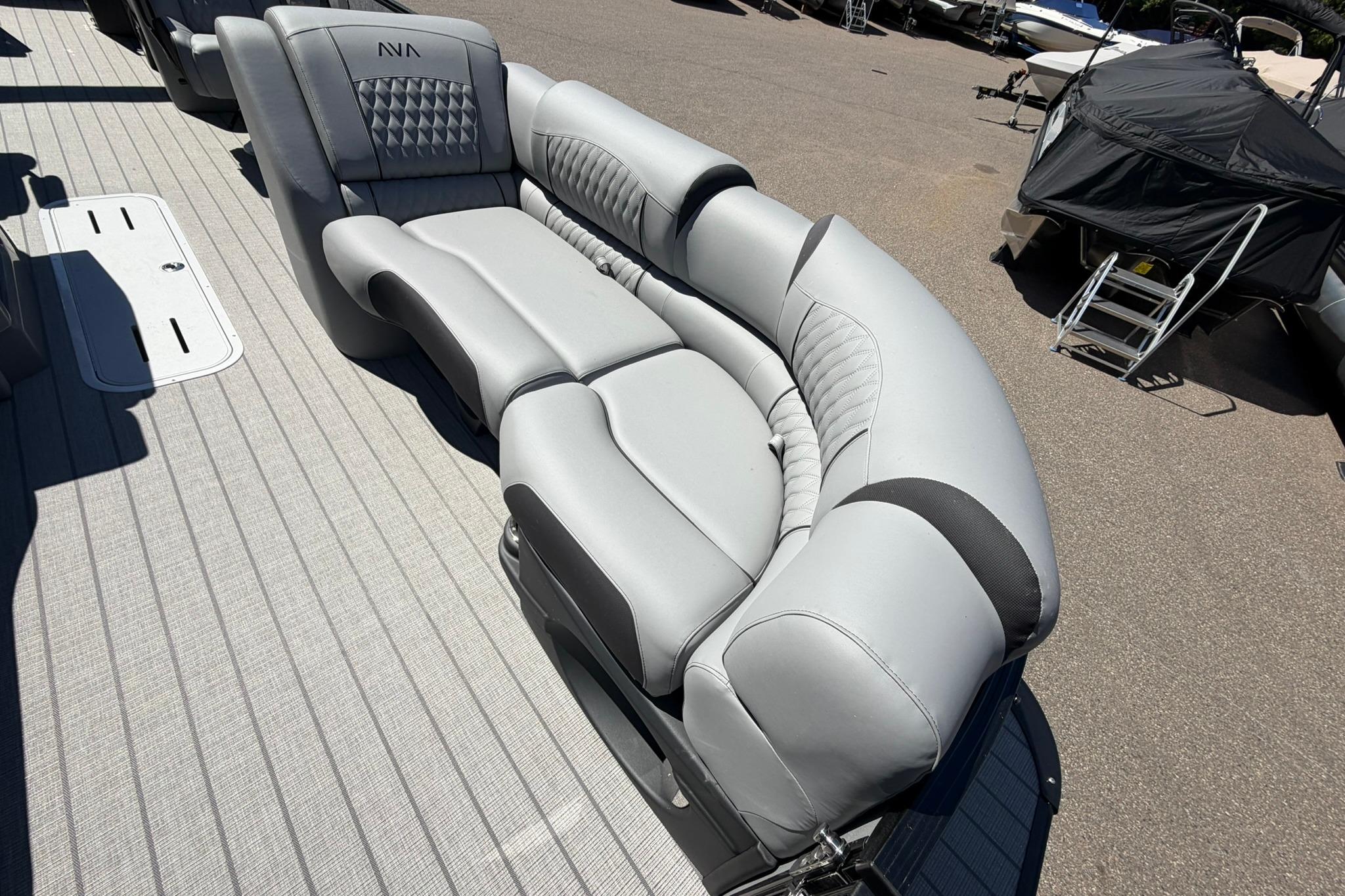 2026 Avalon Catalina Quad Lounge Shift boat with luxurious gray seating on deck.