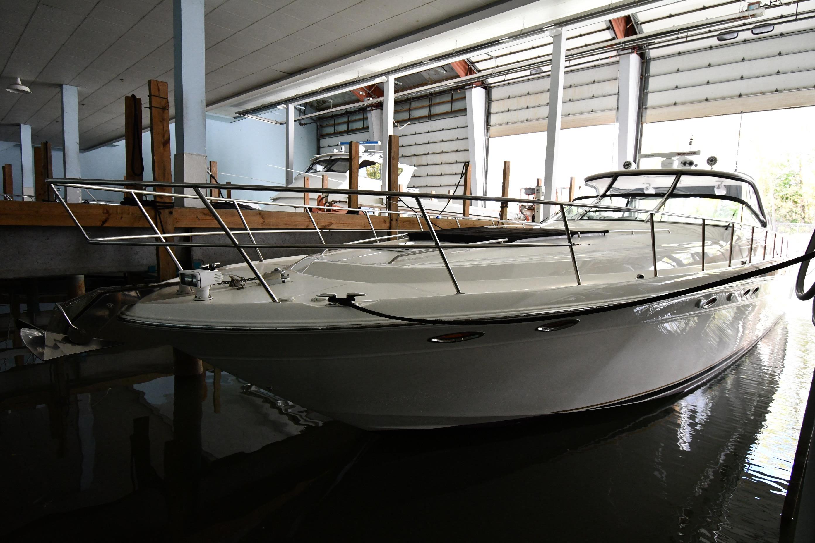2001 Sea Ray 540 Sundancer yacht docked in a marina.
