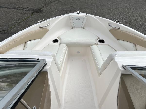 2013 Regal 1900 boat interior with white and beige seating.