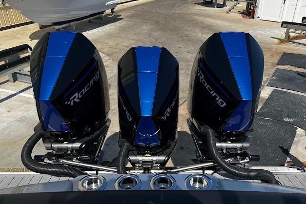Triple outboard engines on a 2022 Nor-Tech 390 Sport Center Console boat.