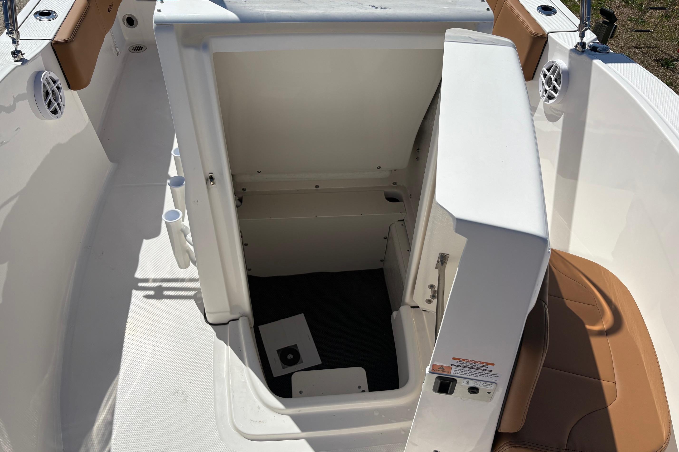 2026 Robalo R180 Center Console boat interior with open storage compartment.