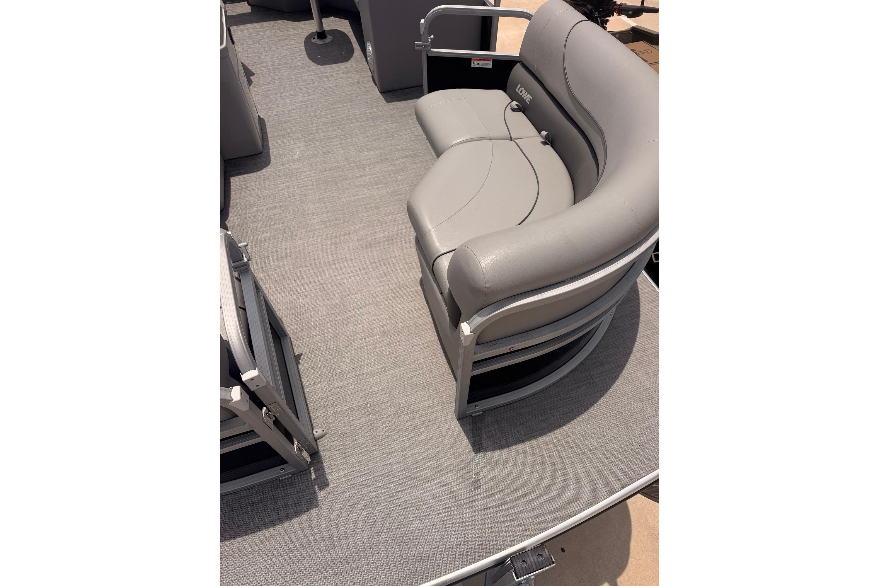 2021 Lowe SS 210 pontoon boat with gray seating and flooring.