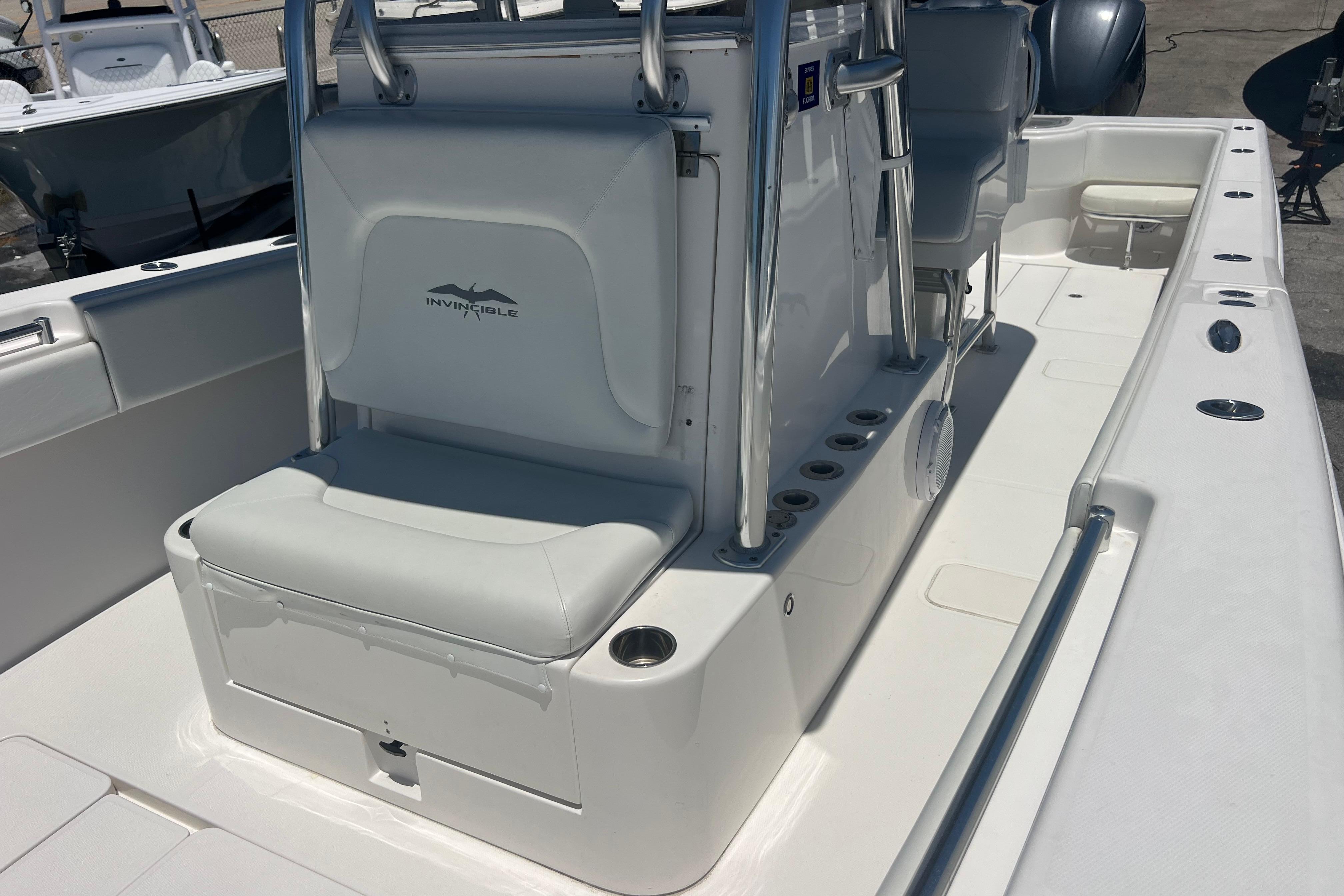 2012 Invincible 33 Open Fisherman boat interior with seating and rod holders.