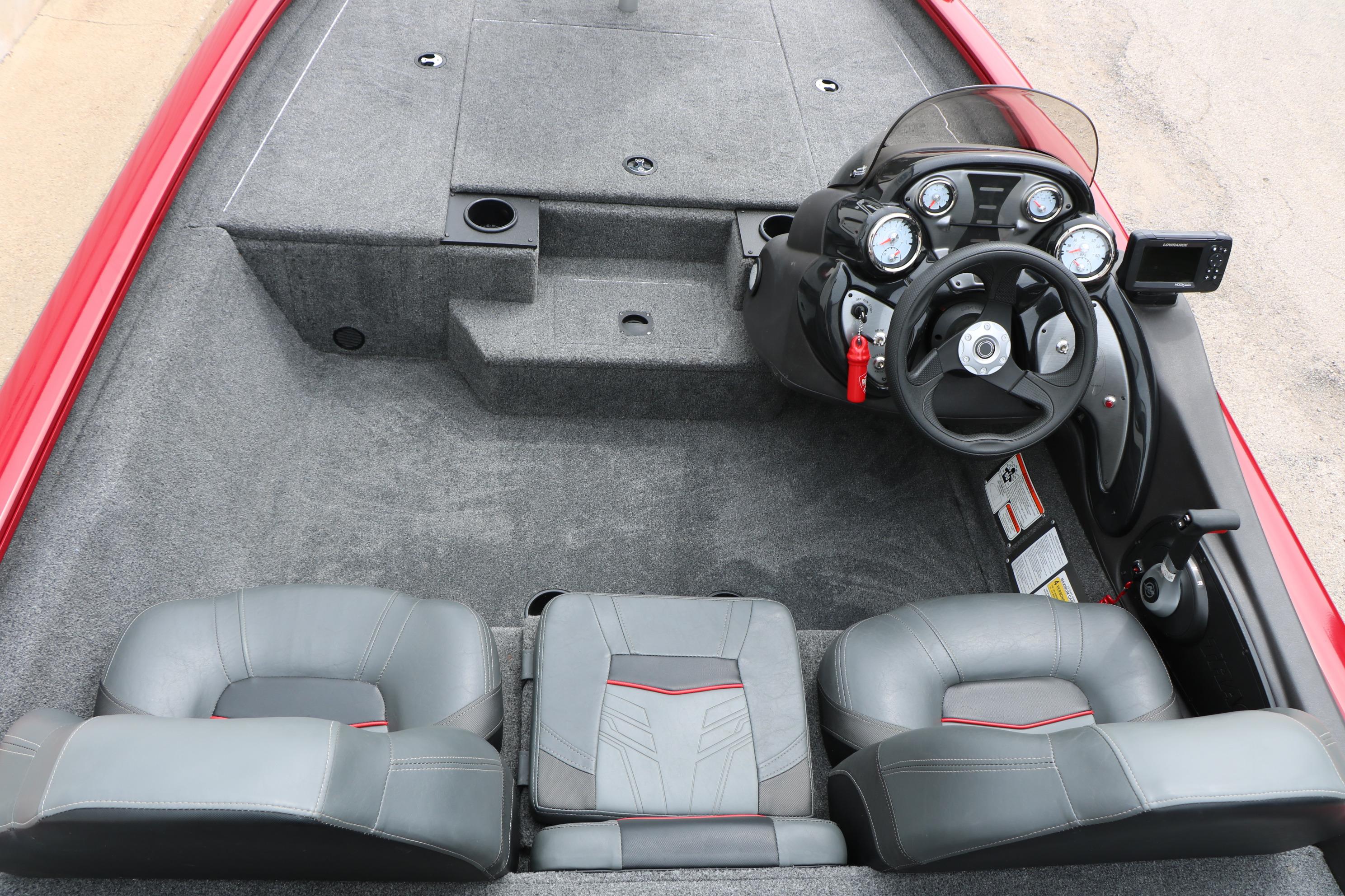 2024 Tracker Pro Team 175 boat interior with steering console and seating.