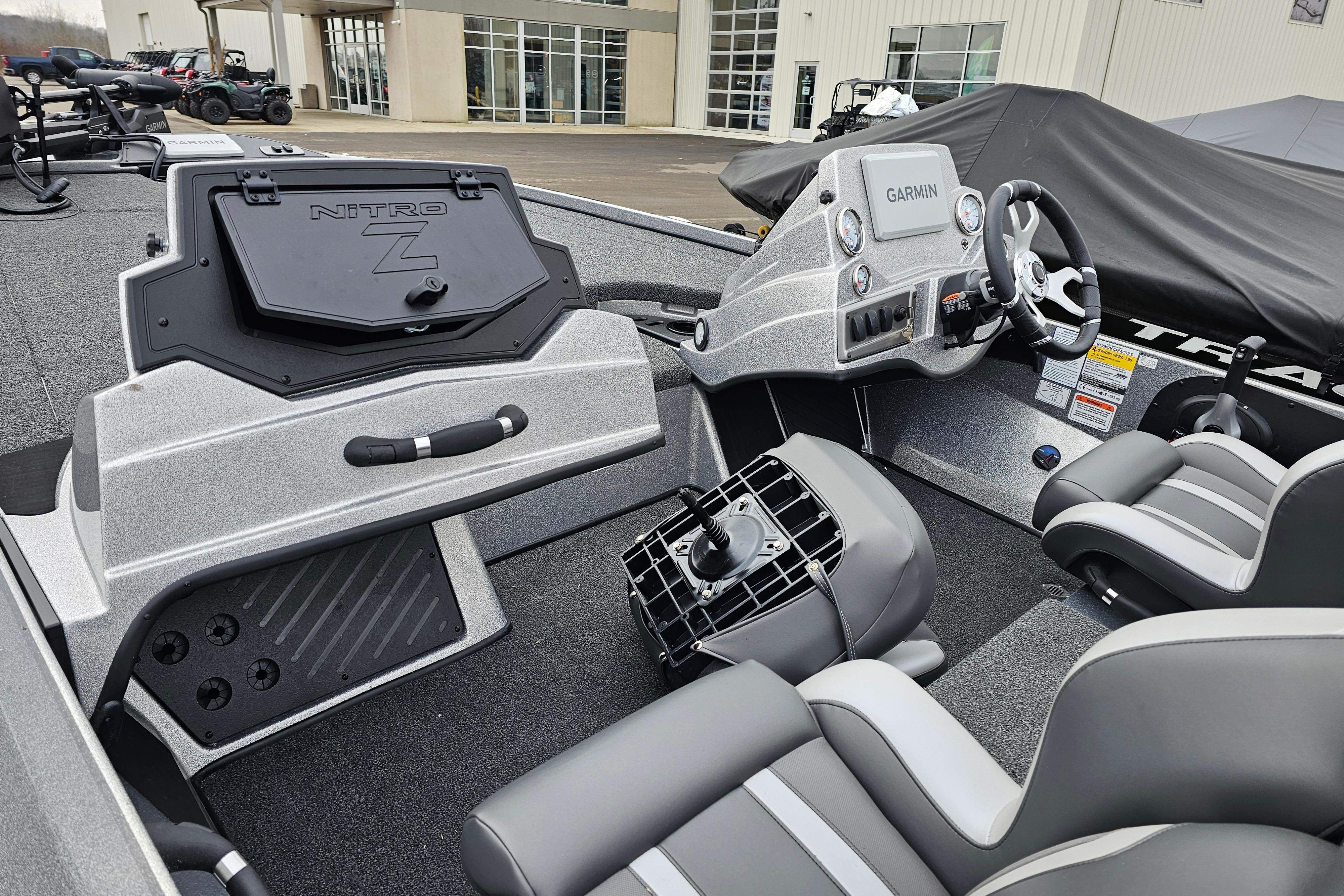 2025 Nitro Z18 Pro boat interior with Garmin dashboard and sleek seating.