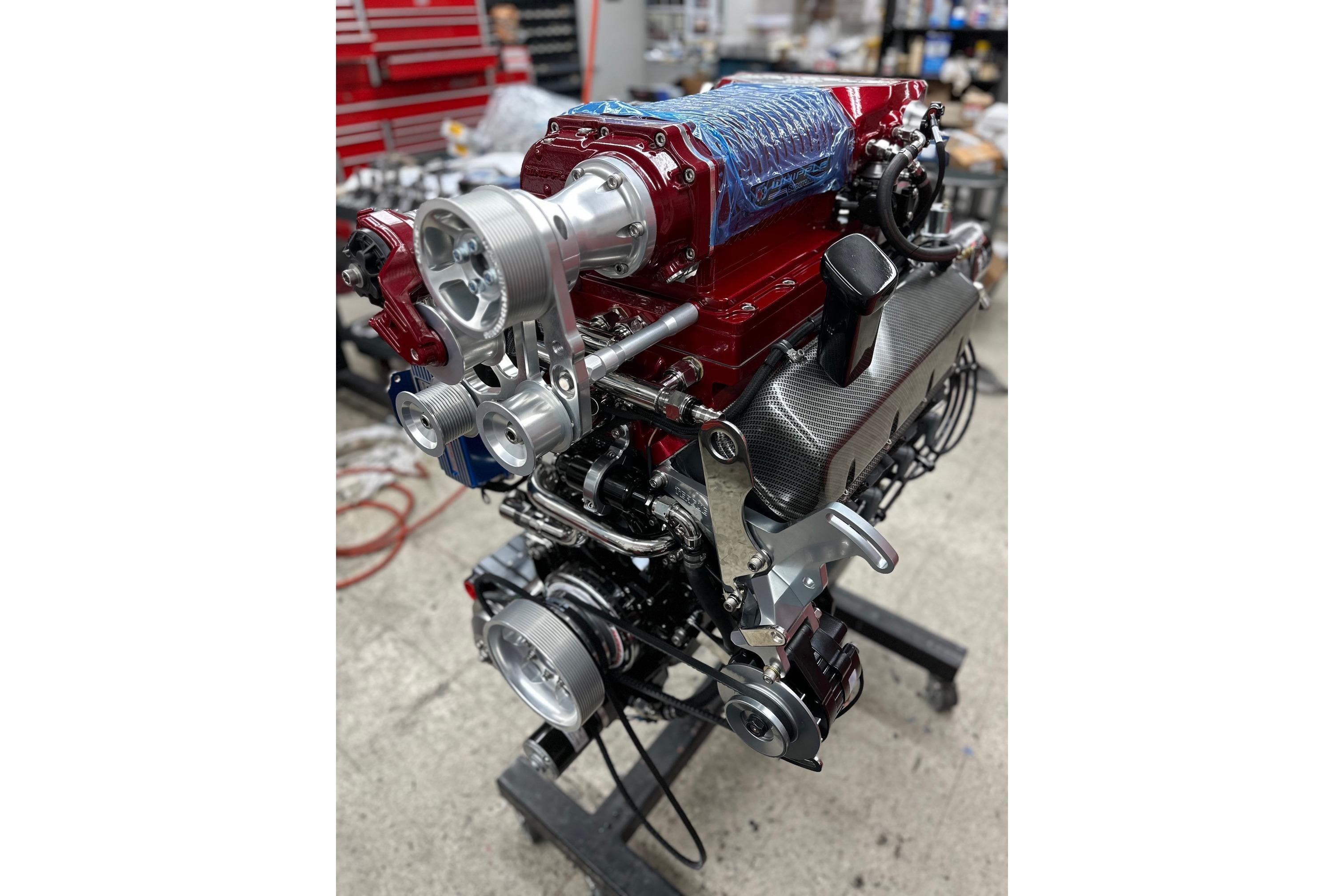 High-performance engine of a 2013 Nordic 39 POKER RUN boat in a workshop setting.
