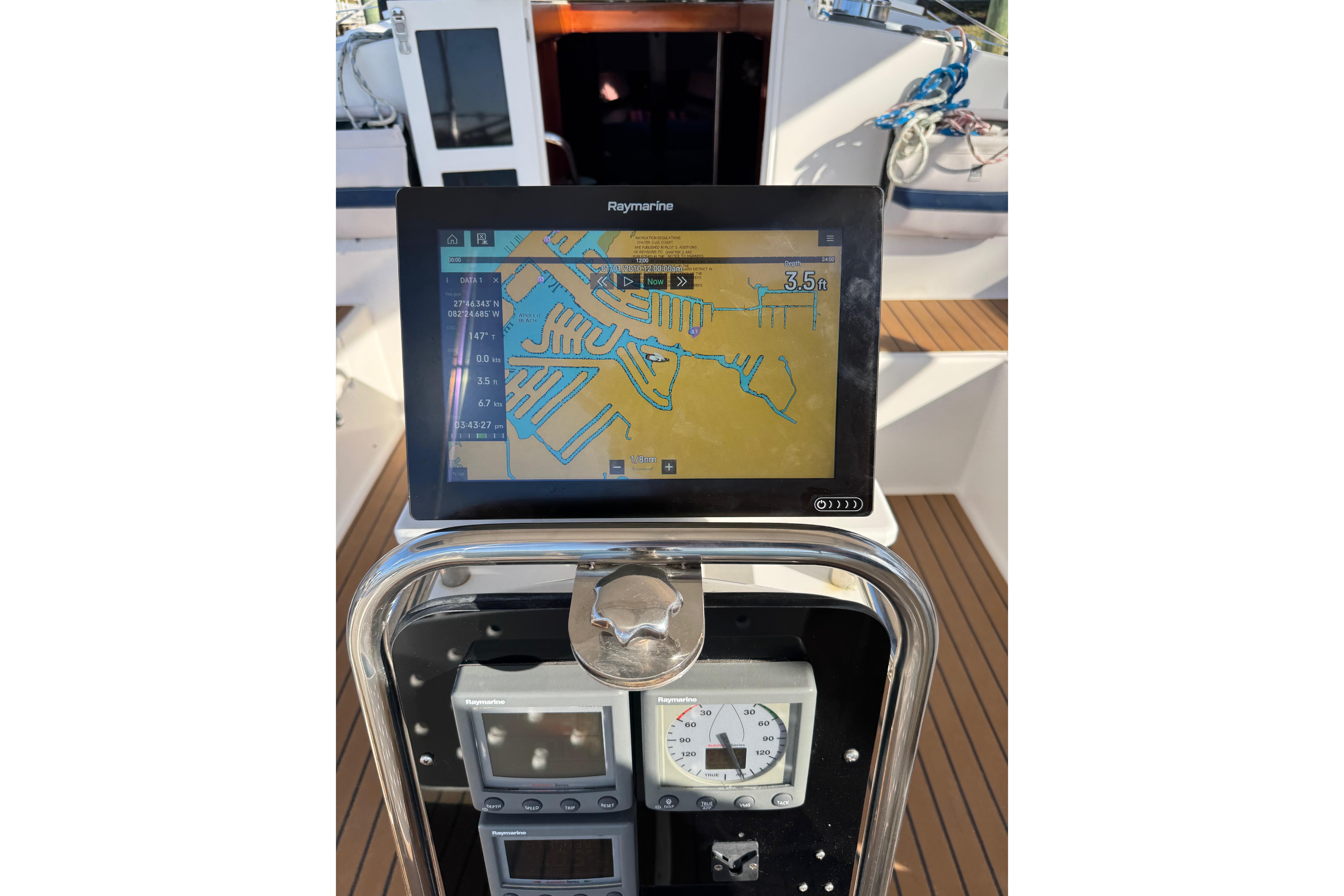 Navigation system on 2006 Shannon Shoalsailer sailboat, displaying nautical chart and instruments.