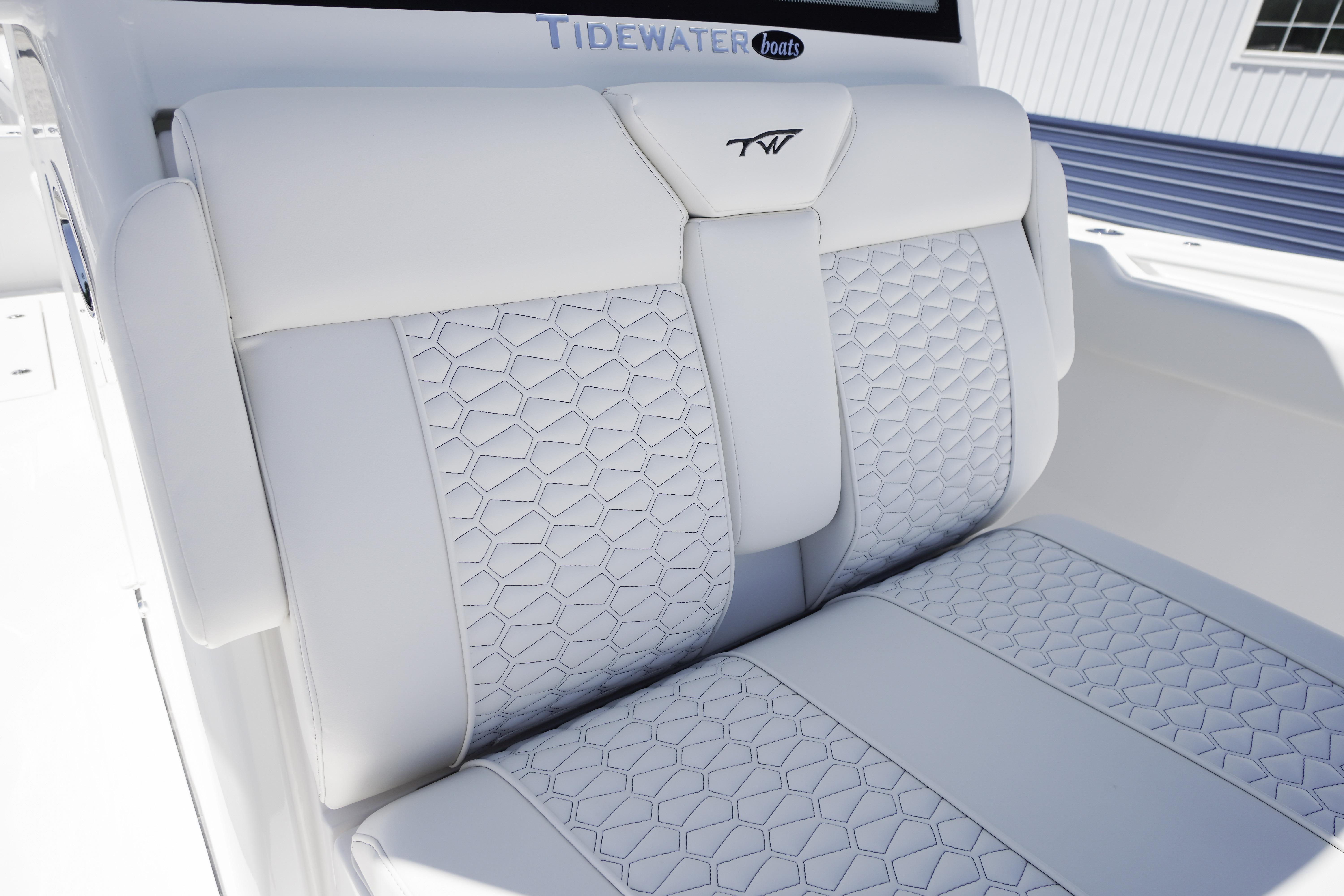 2026 Tidewater 302 CC Adventure boat seat with hexagonal pattern and logo.