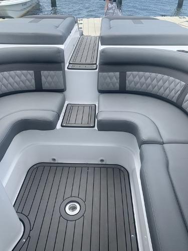 2020 Rinker 29QX BR boat interior with gray seating and deck.