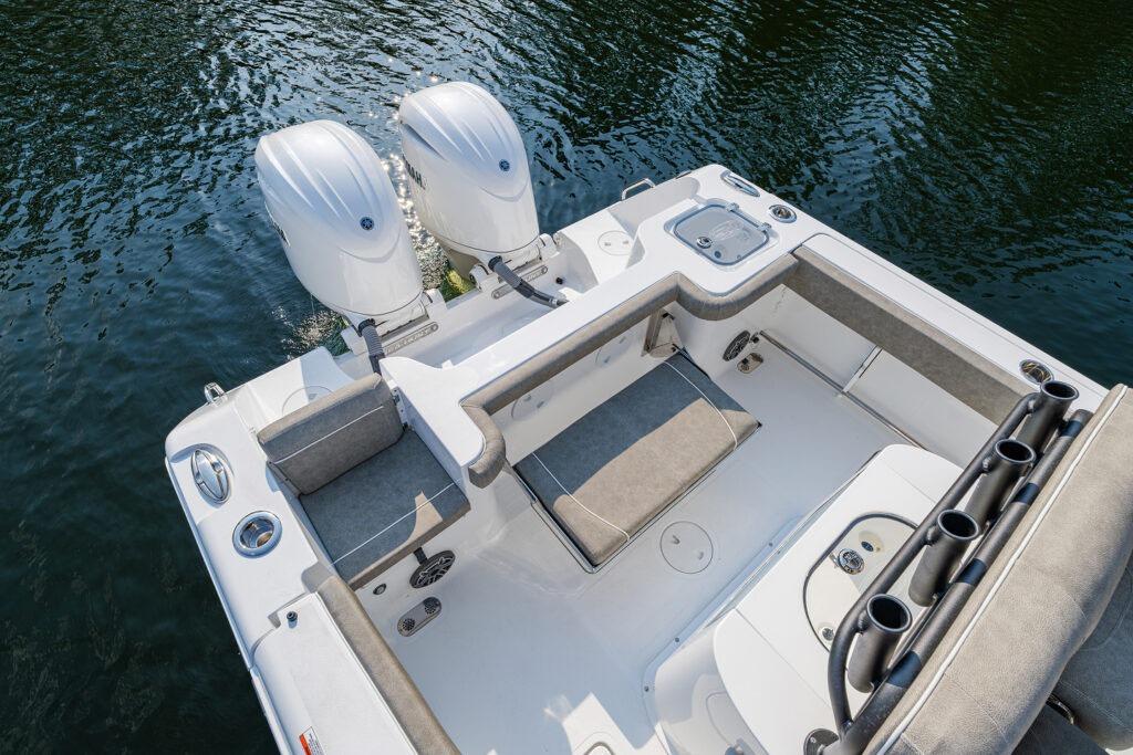 Manufacturer Provided Image: 2026 Sea Hunt Gamefish 25 boat with dual engines, spacious deck, and rod holders on water.