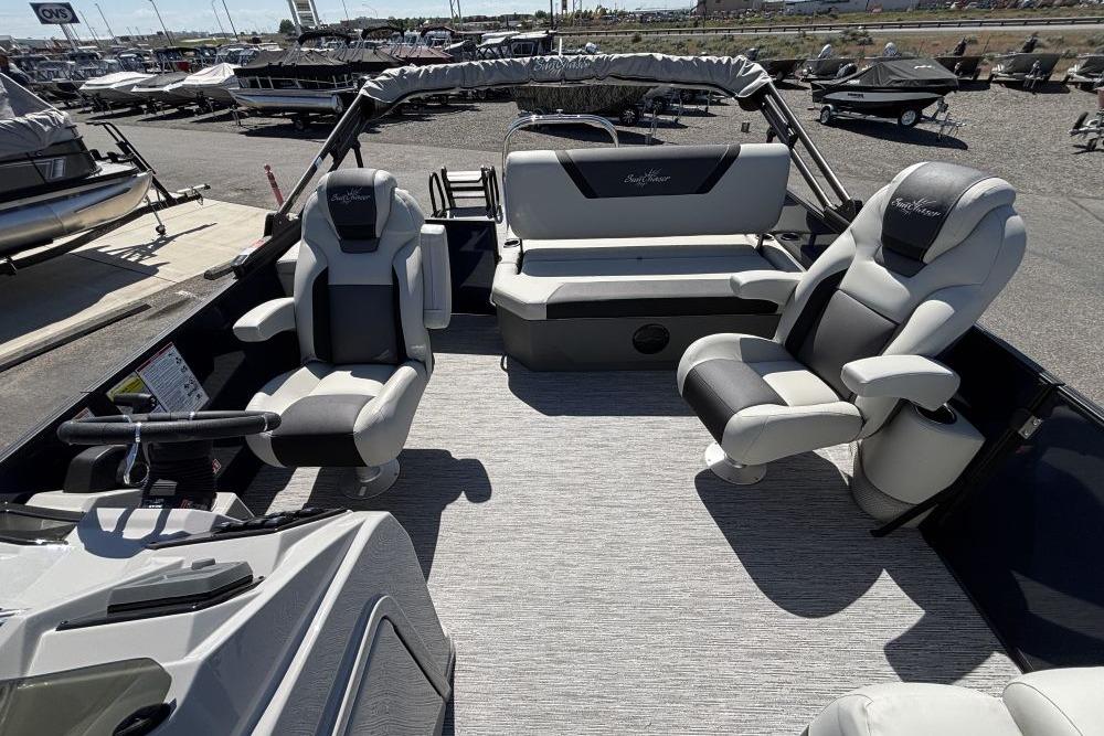 Interior of 2026 SunChaser Geneva Sport 21 SB DH pontoon boat with plush seating.