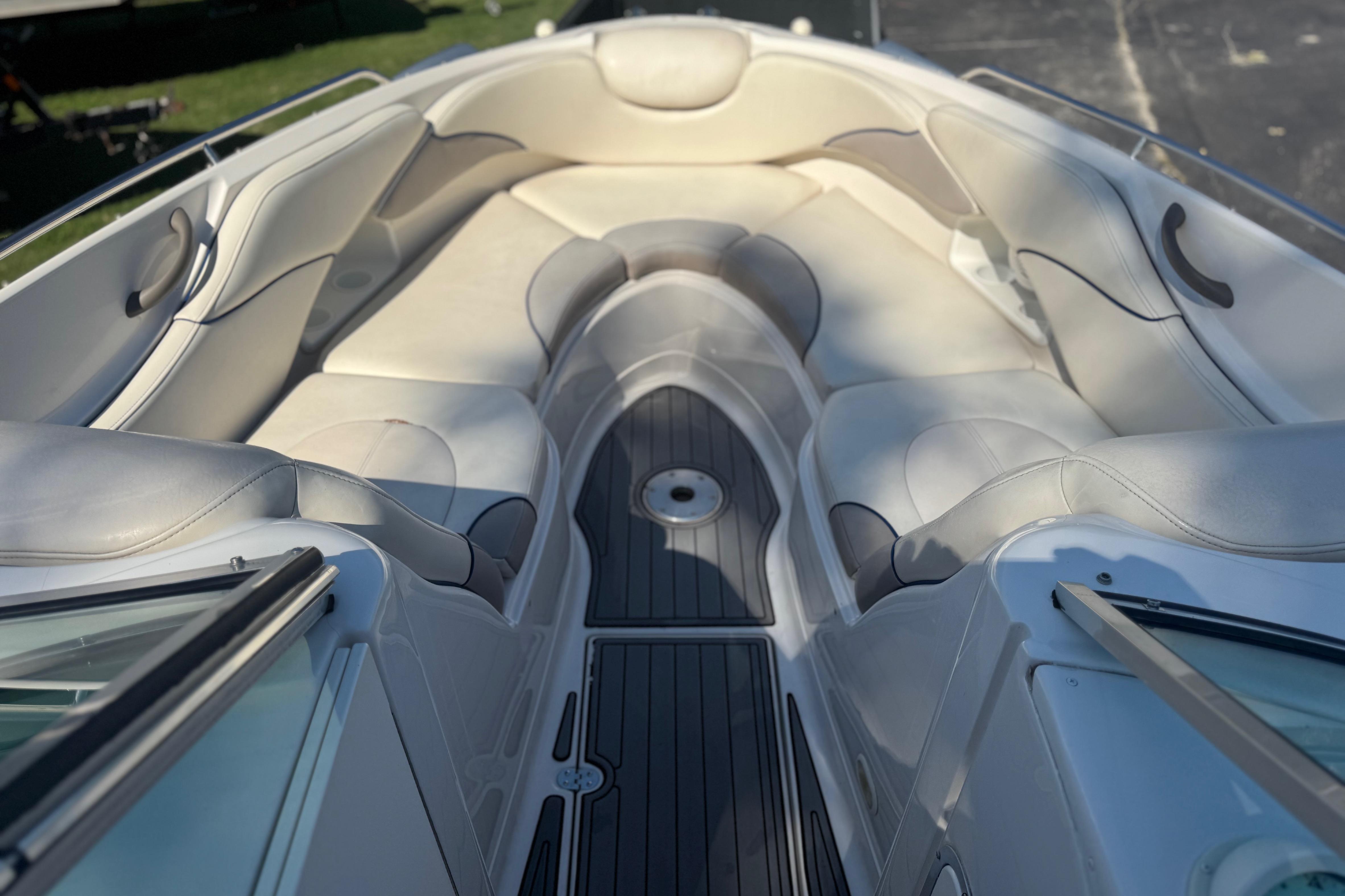 Bow seating area of a Monterey 268SS Super Sport boat with cushioned seats.