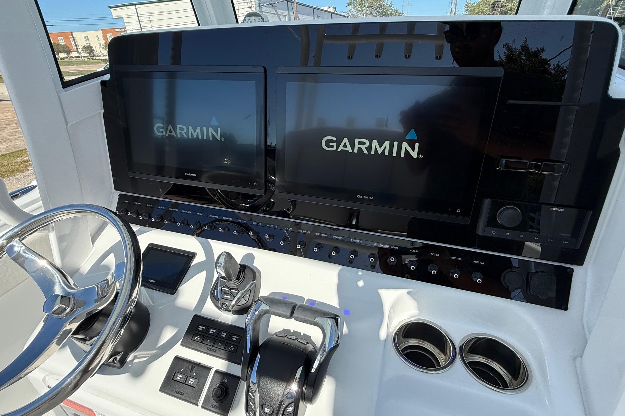 2026 Sea Hunt Gamefish 30 Coffin Box dashboard with dual Garmin displays and controls.
