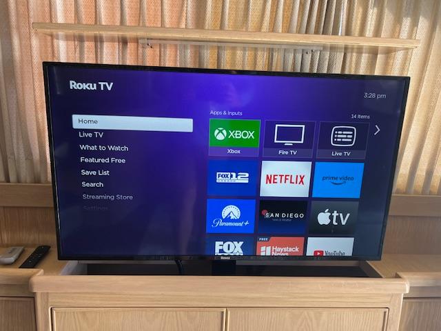 Roku TV interface on a 1997 Riviera 43 Open Flybridge yacht.