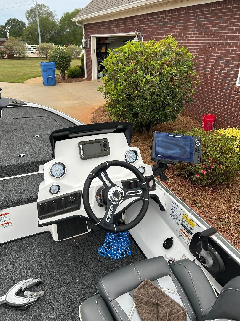 The image shows the cockpit of a 2020 Nitro Z18 boat with modern instruments.