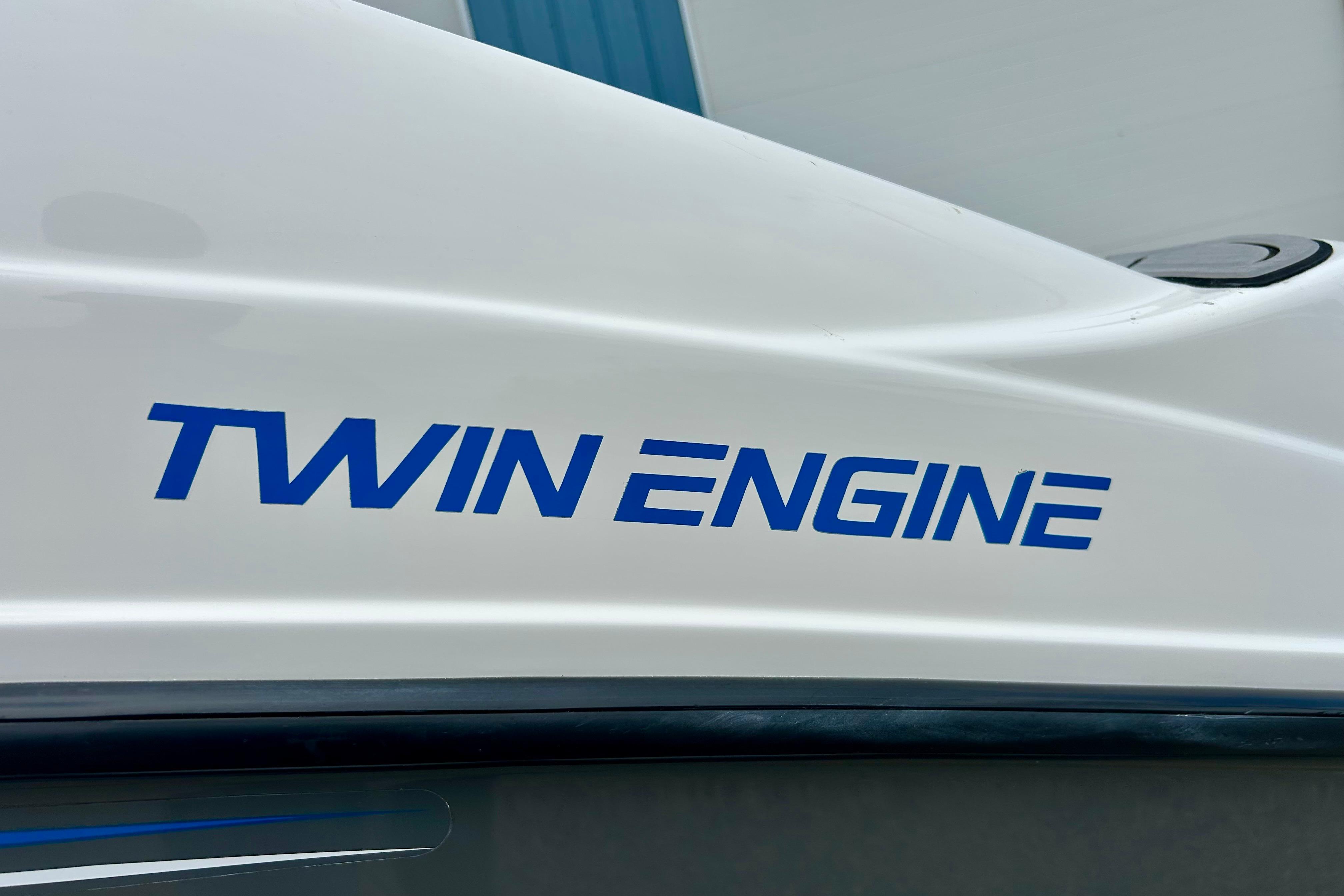 2015 Yamaha AR210 boat with "Twin Engine" label in blue text.