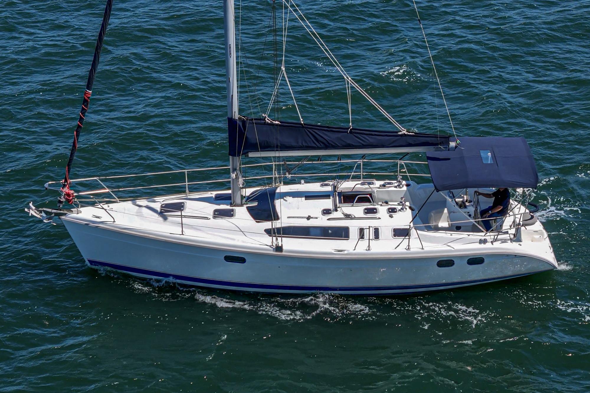 Sailing yacht Hunter 376, 1996 model, cruising on open water.