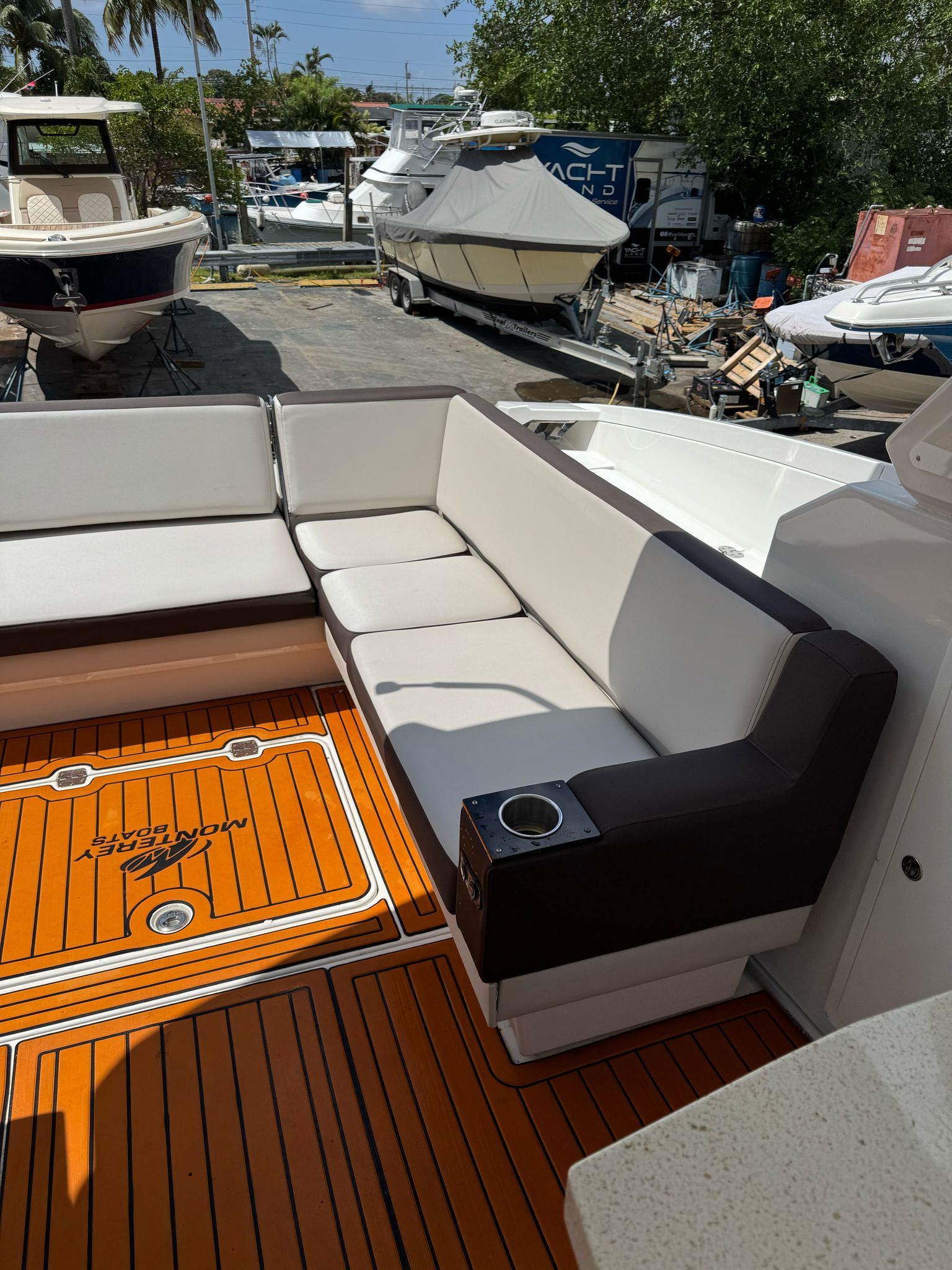 2015 Monterey 360 Sport Coupe with sleek seating and wooden deck.