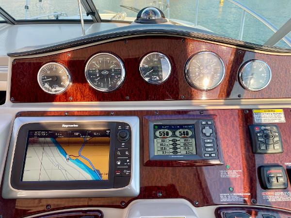 Dashboard of 2014 Sea Ray 330 Sundancer with navigation and control instruments.