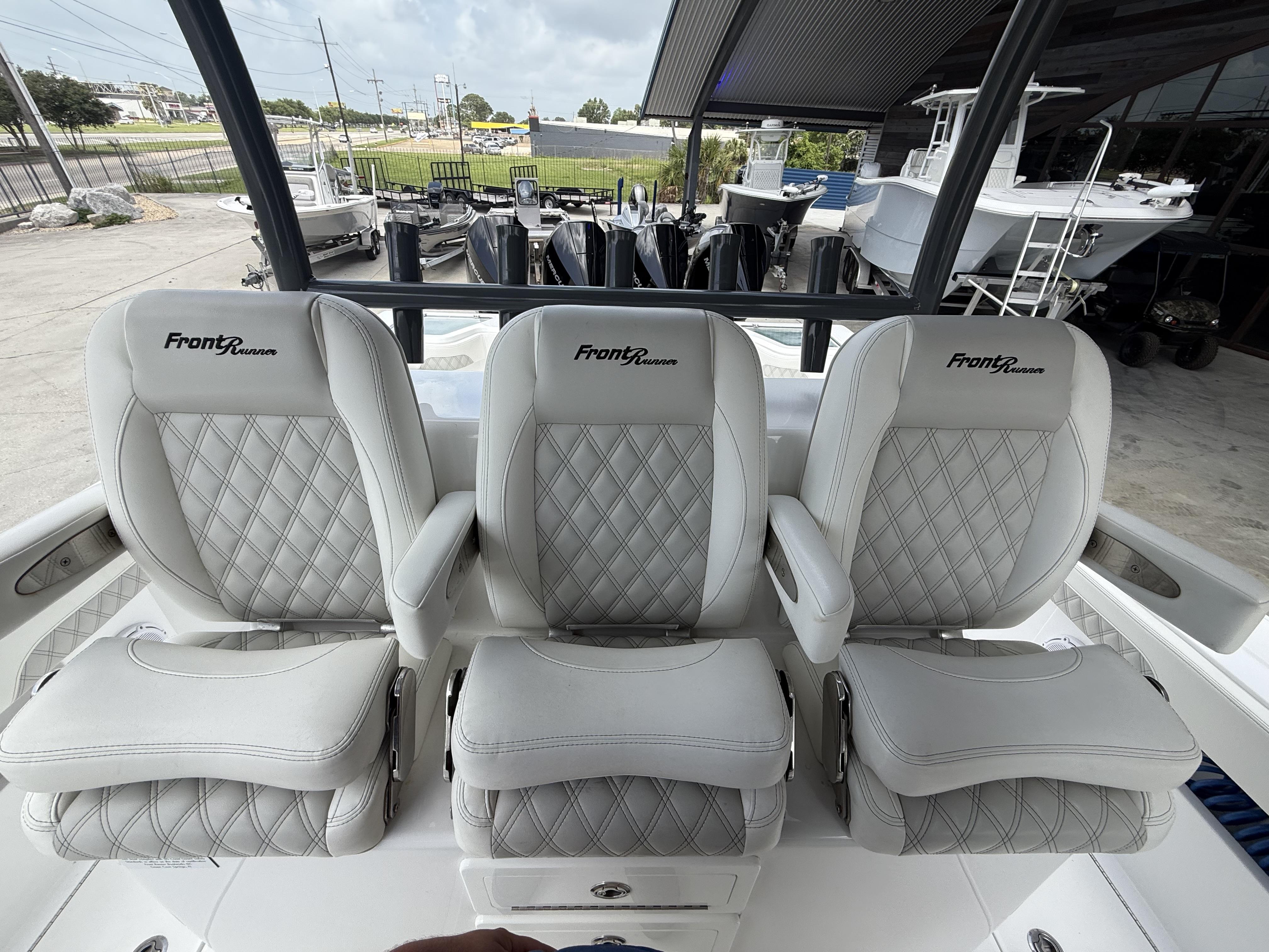 2024 Front Runner 39 CC boat with luxurious diamond-stitched seating.