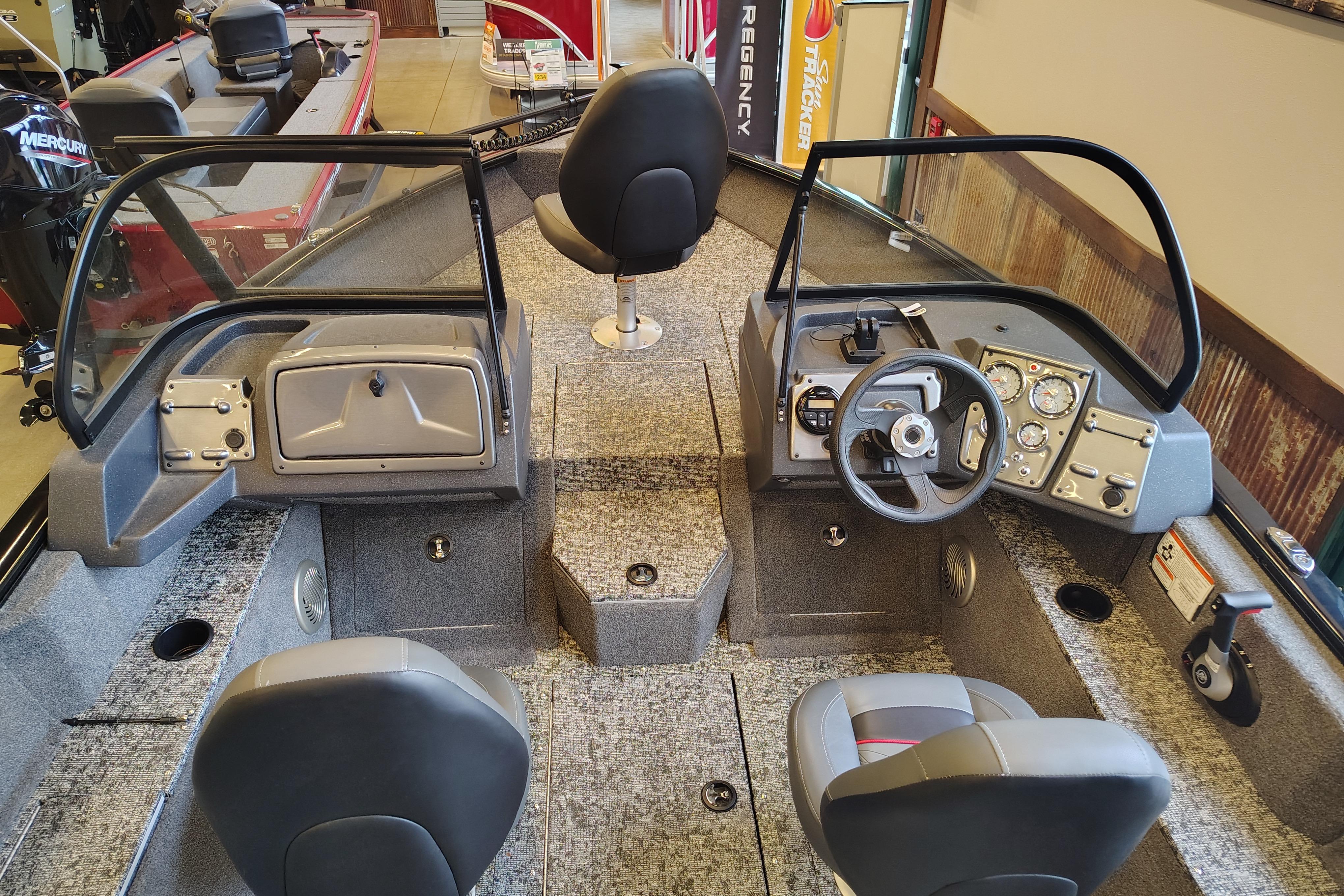 2026 Tracker Pro Guide V-175 WT boat interior with steering console and seating.