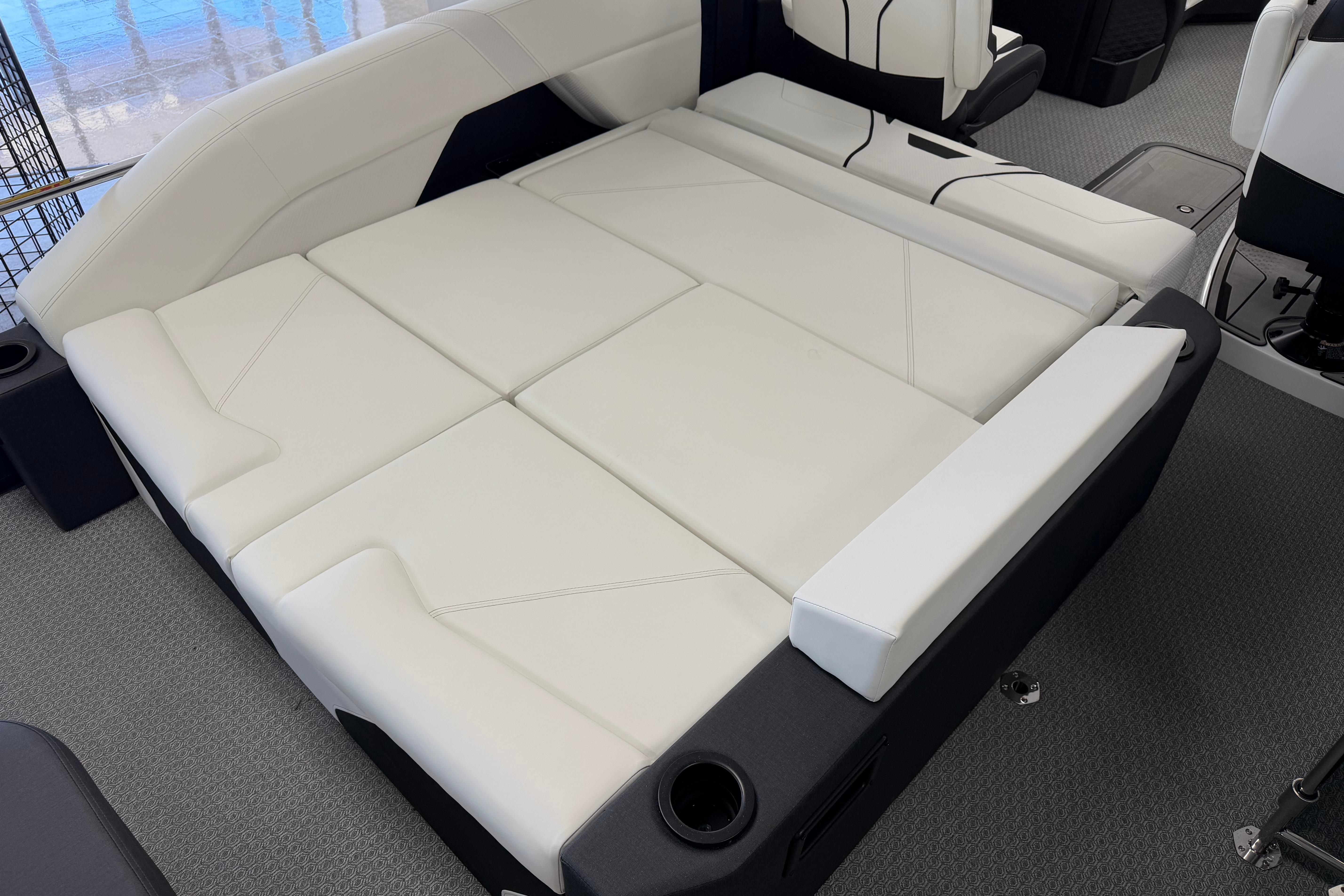 Luxurious white seating area in 2026 Evotti 721CS boat interior.