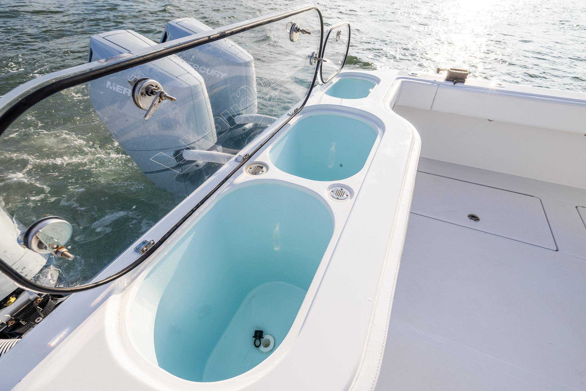2026 Front Runner 37 Catamaran with dual Mercury engines and livewell on deck.