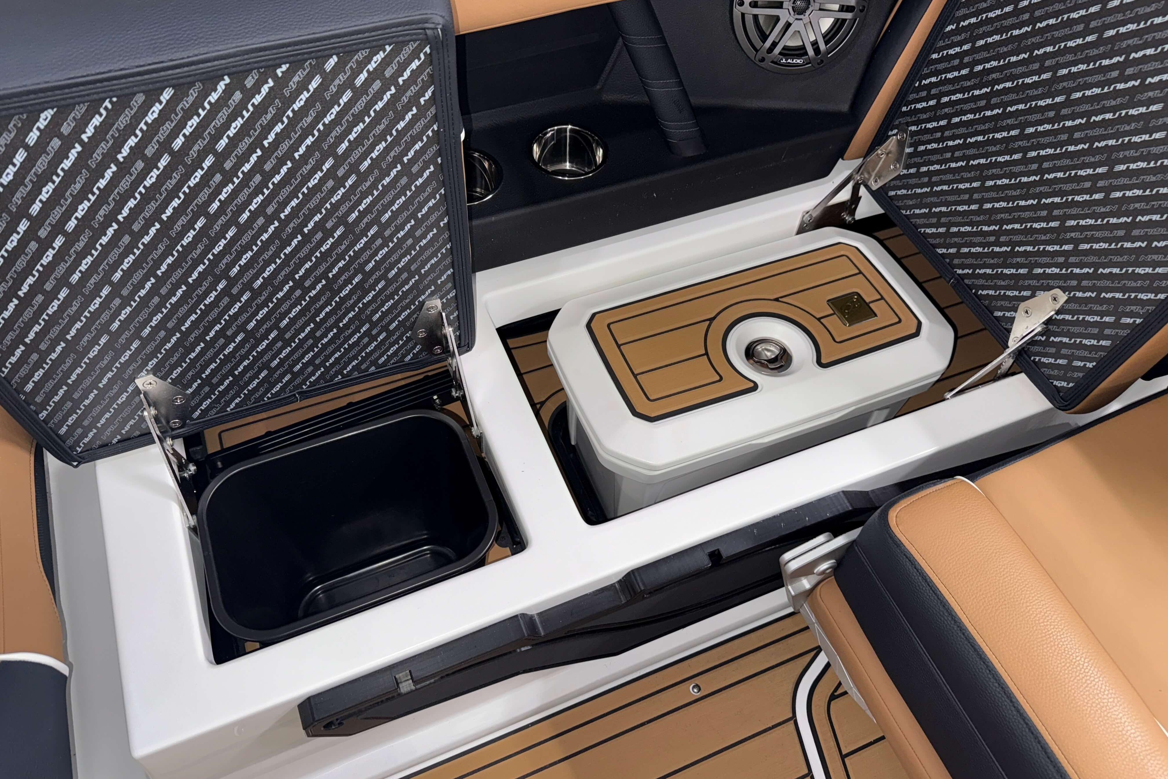 2026 Nautique Super Air Nautique S23 interior storage compartments and seating detail.