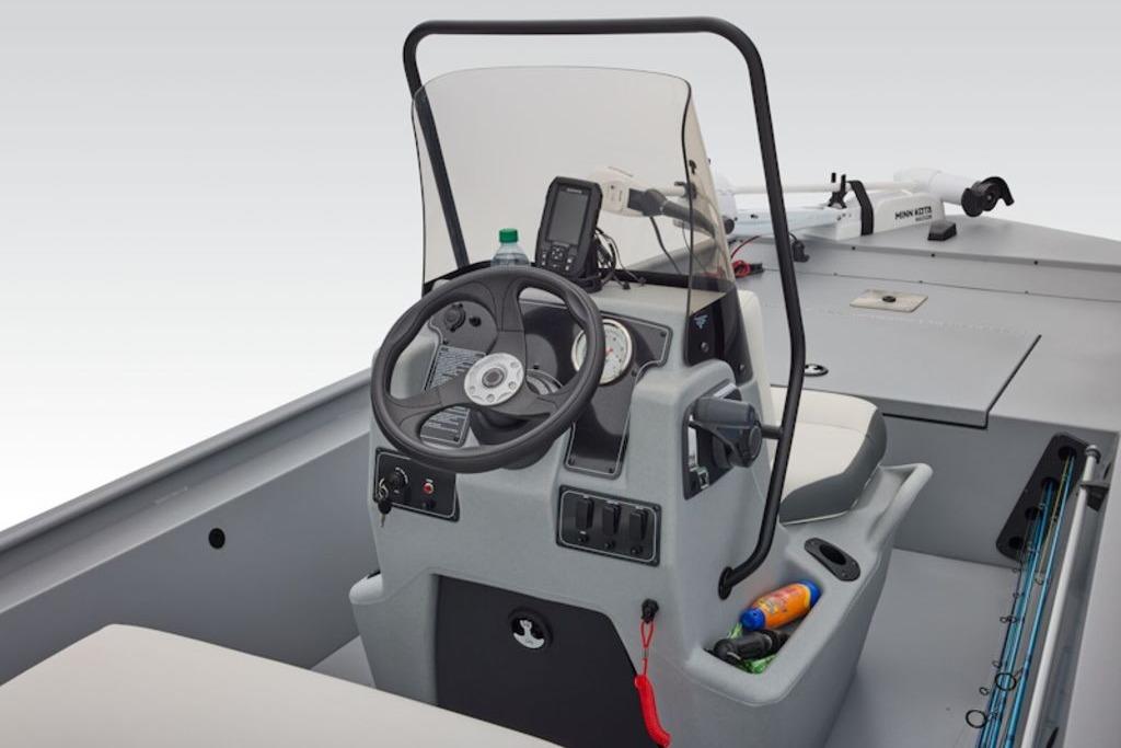 2026 Tracker Bass Tracker Classic CC boat console with steering wheel and controls.